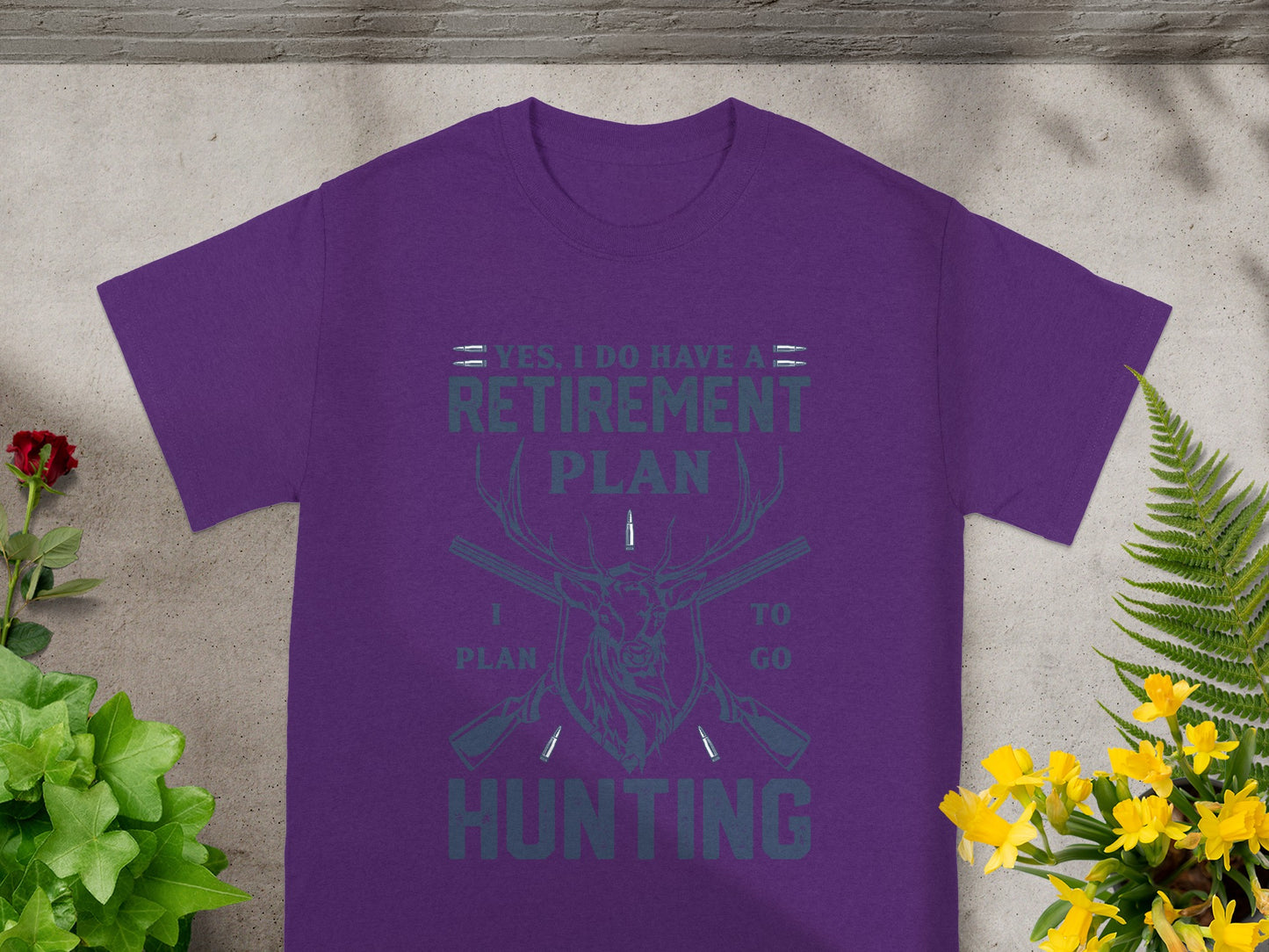 Purple t-shirt with "Yes, I do have a retirement plan. I plan to go hunting."