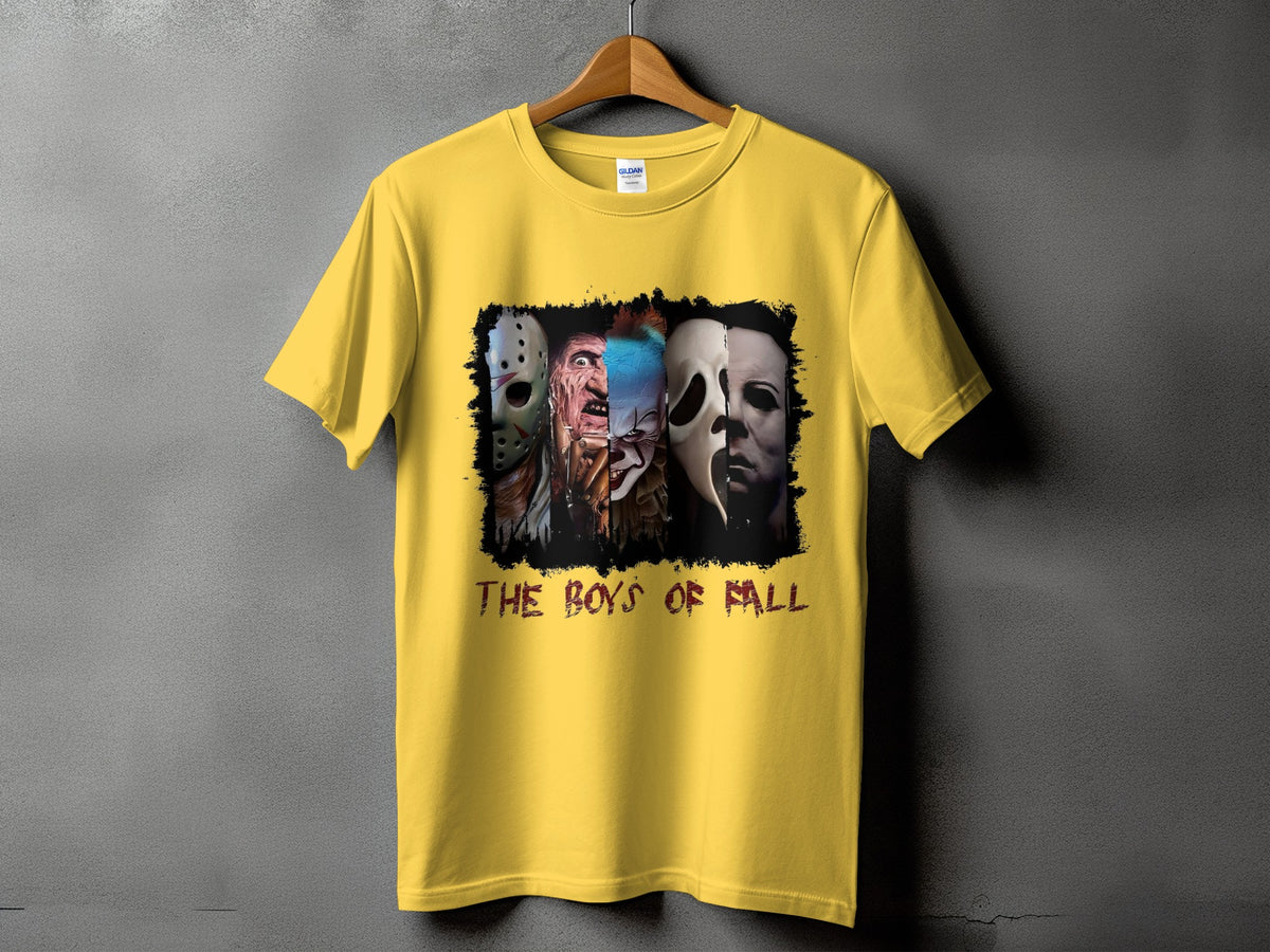 Yellow t-shirt with graphic of horror movie villains and text "THE BOYS OF FALL".
