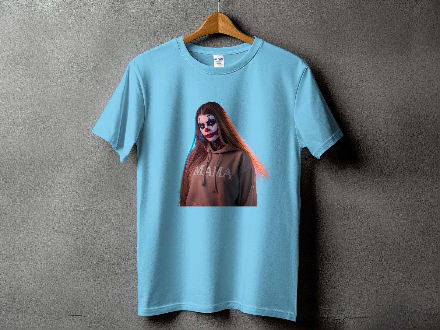 Light blue t-shirt with a graphic of a woman in clown makeup and a "MAMA" hoodie.