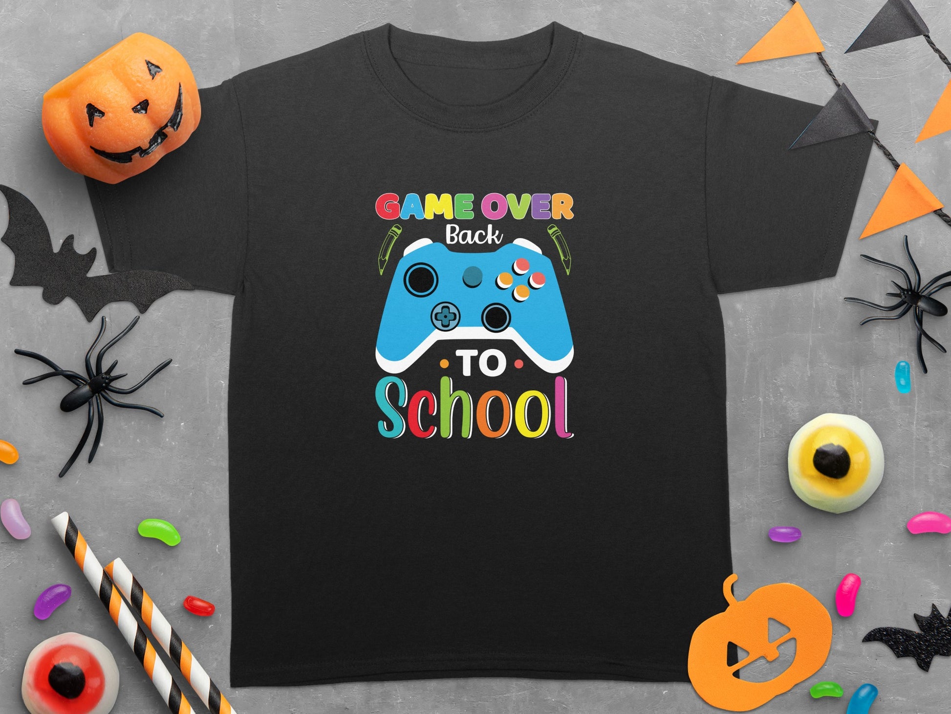 Black t-shirt with "Game Over Back To School" and blue controller graphic.