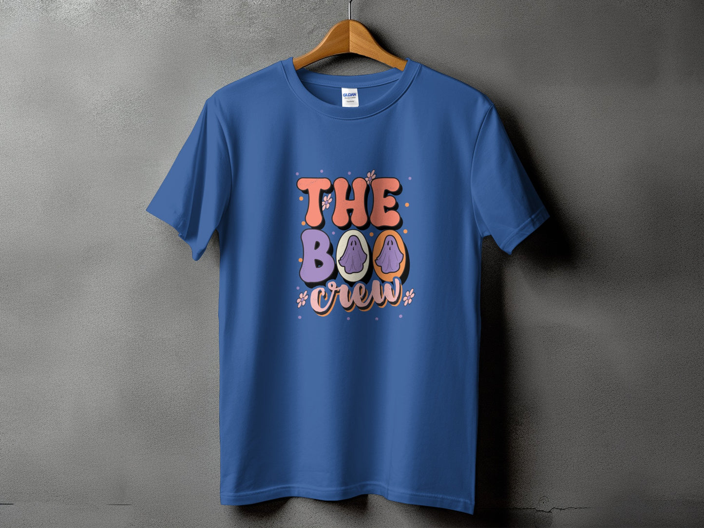 Blue t-shirt with "The Boo Crew" text and ghost graphics.