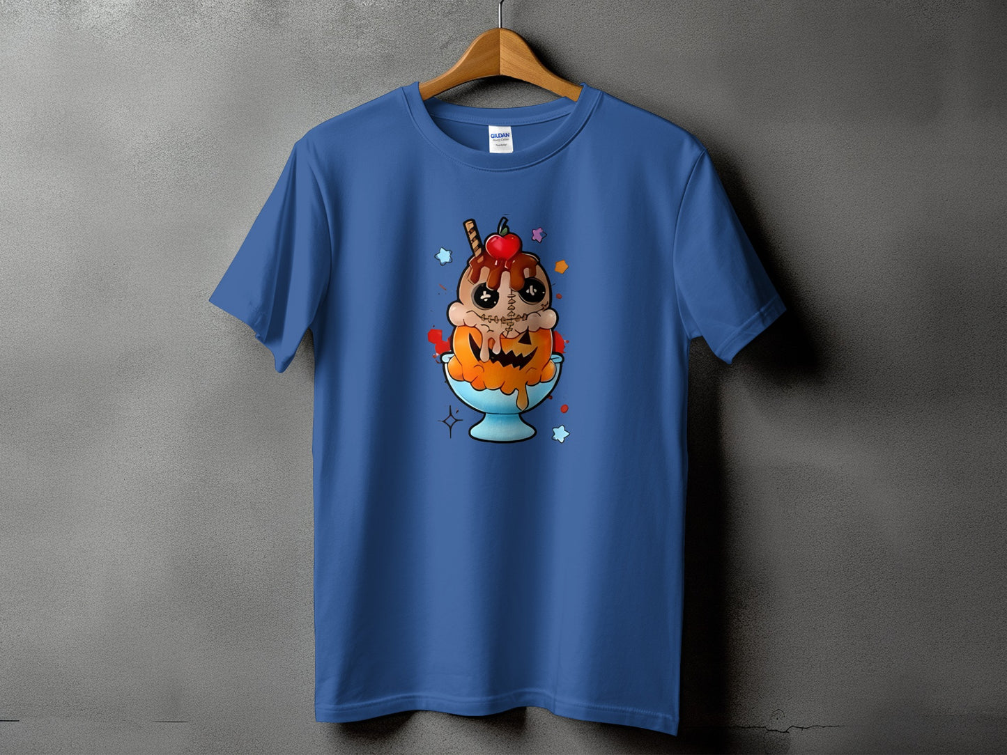 Blue t-shirt with a cartoon ice cream sundae in a pumpkin bowl design.