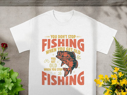 White t-shirt with graphic: You Don't Stop Fishing When You Get Old