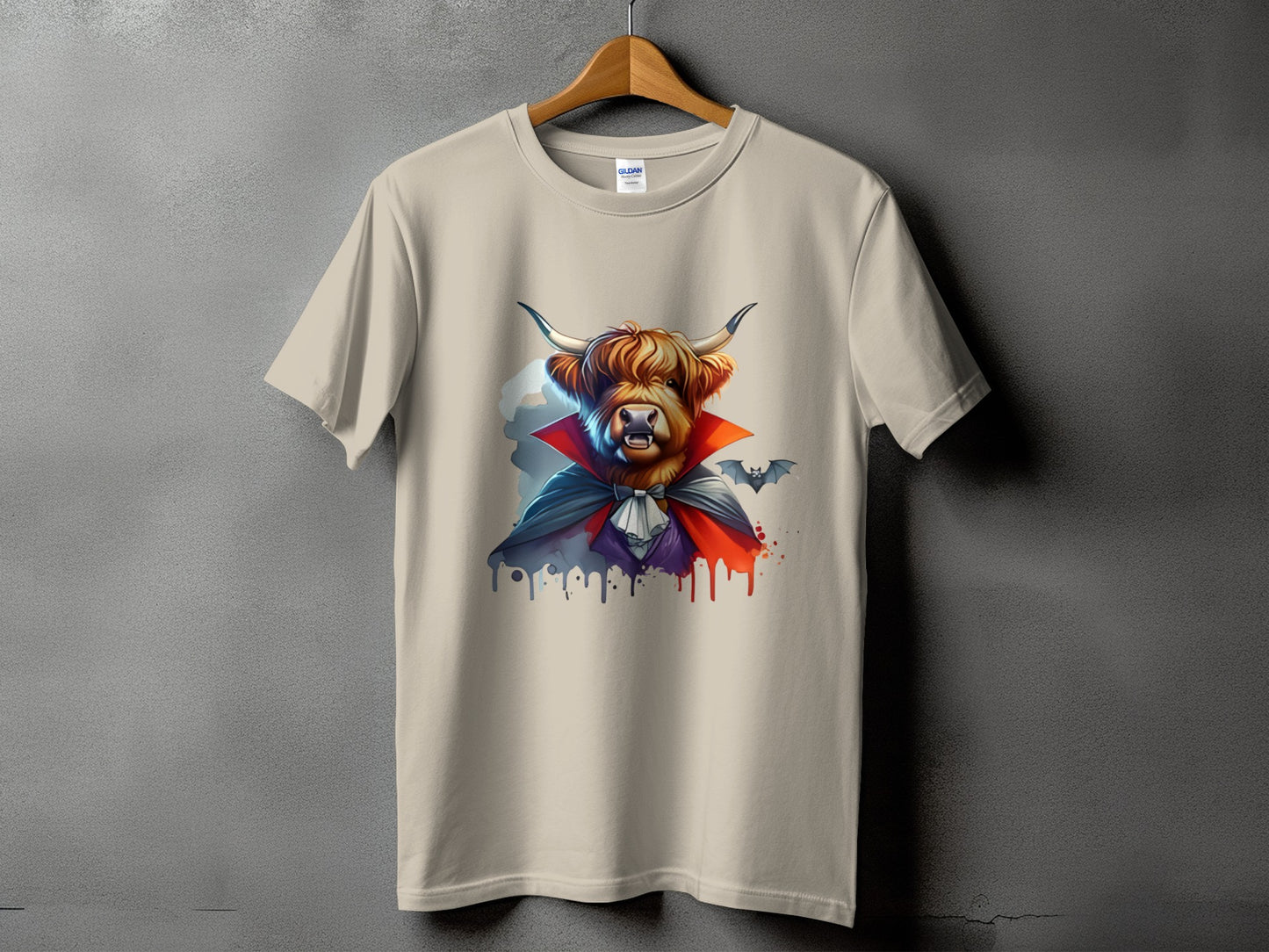 Scottish Highland cow dressed as a vampire with bats on a t-shirt.