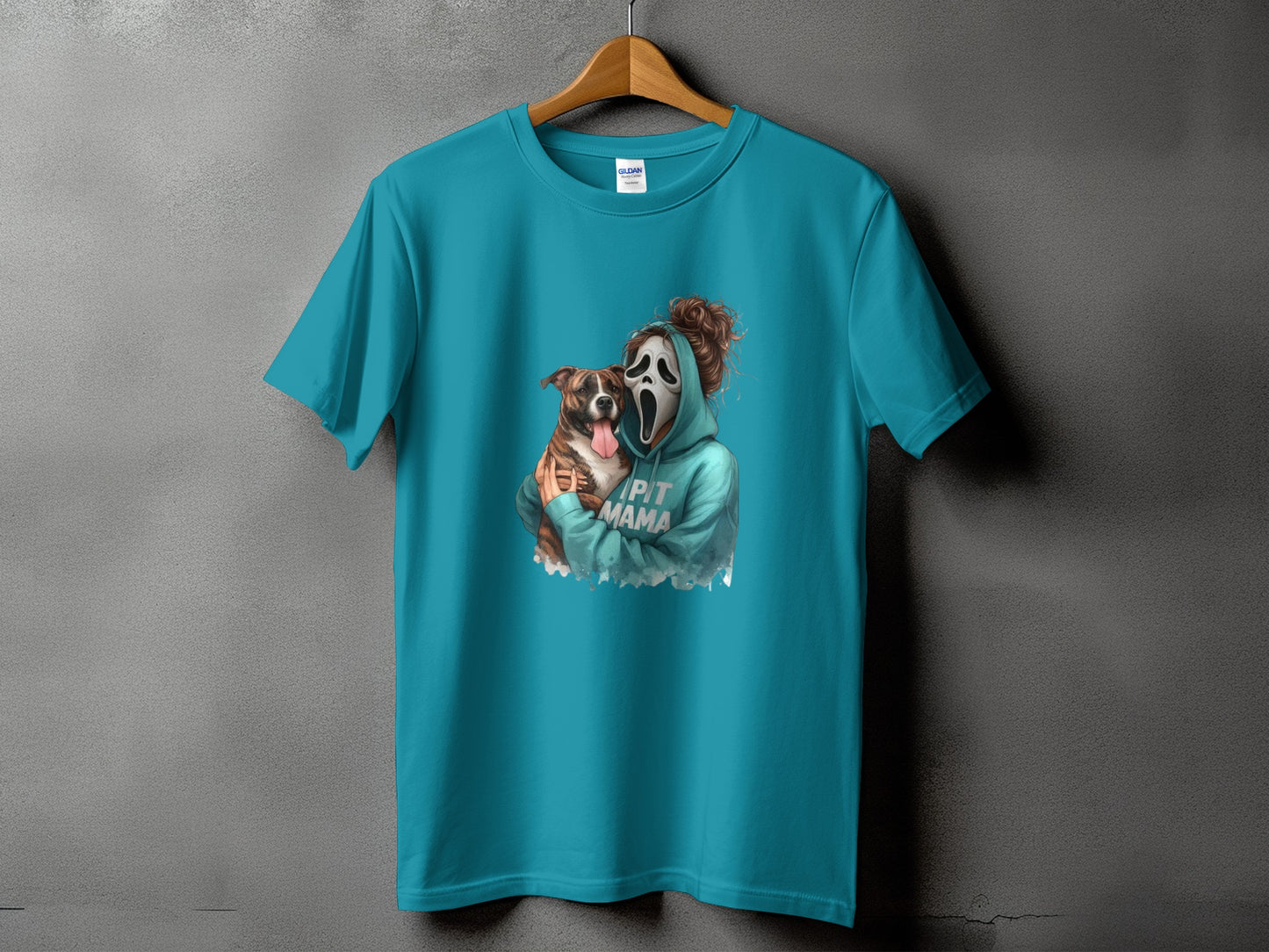 Teal t-shirt with ghost face and pitbull design, reads "PIT MAMA."
