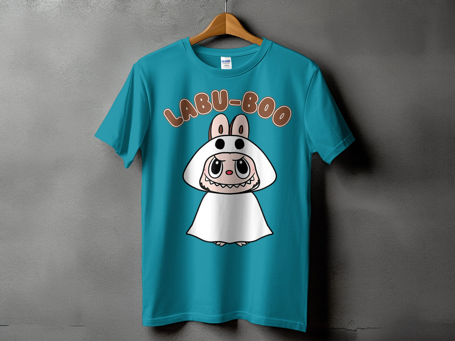 Teal t-shirt with "LABU-BOO" text and a cute cartoon character in a white bunny costume.