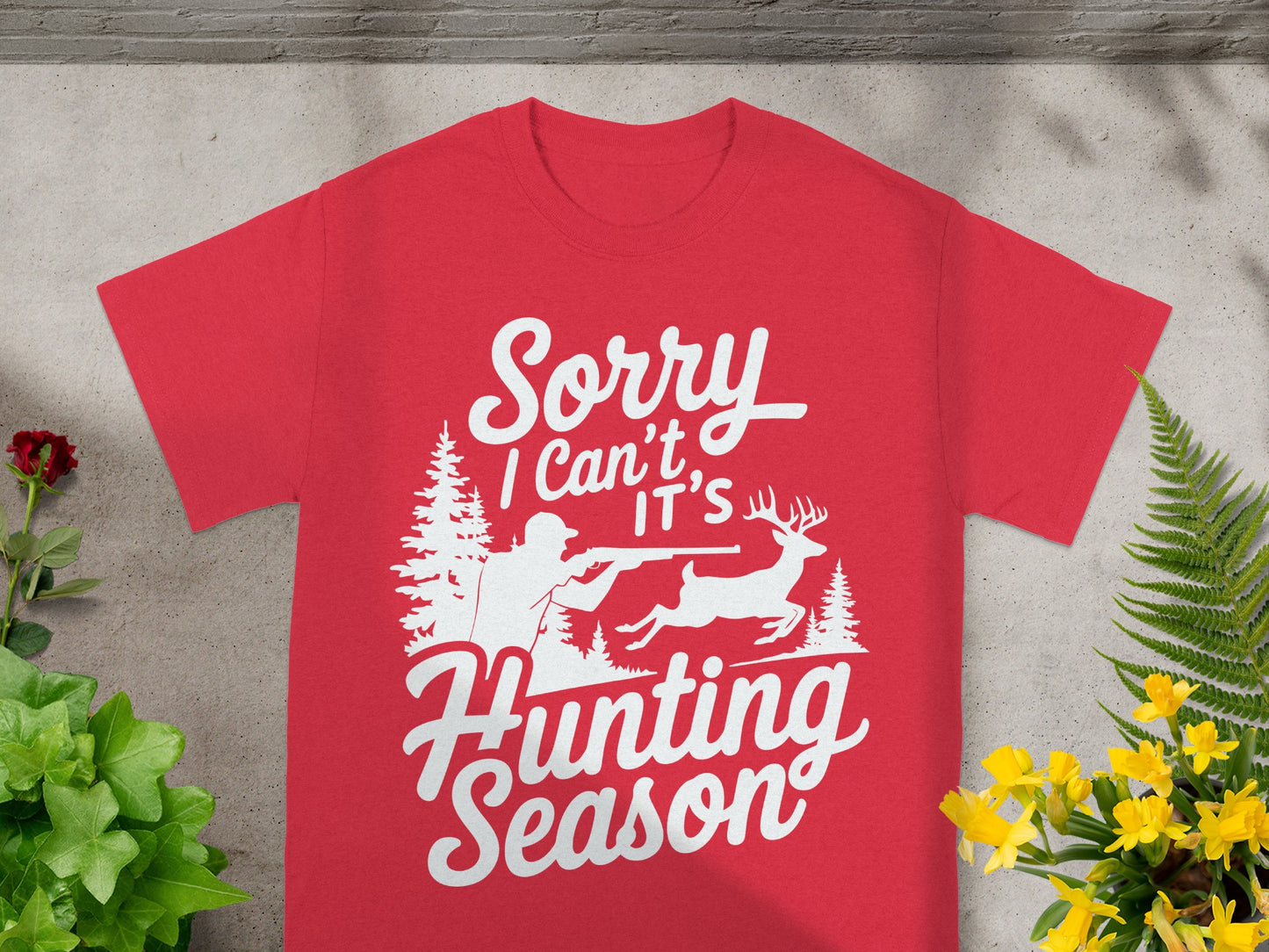Red t-shirt with white text and hunting graphic.