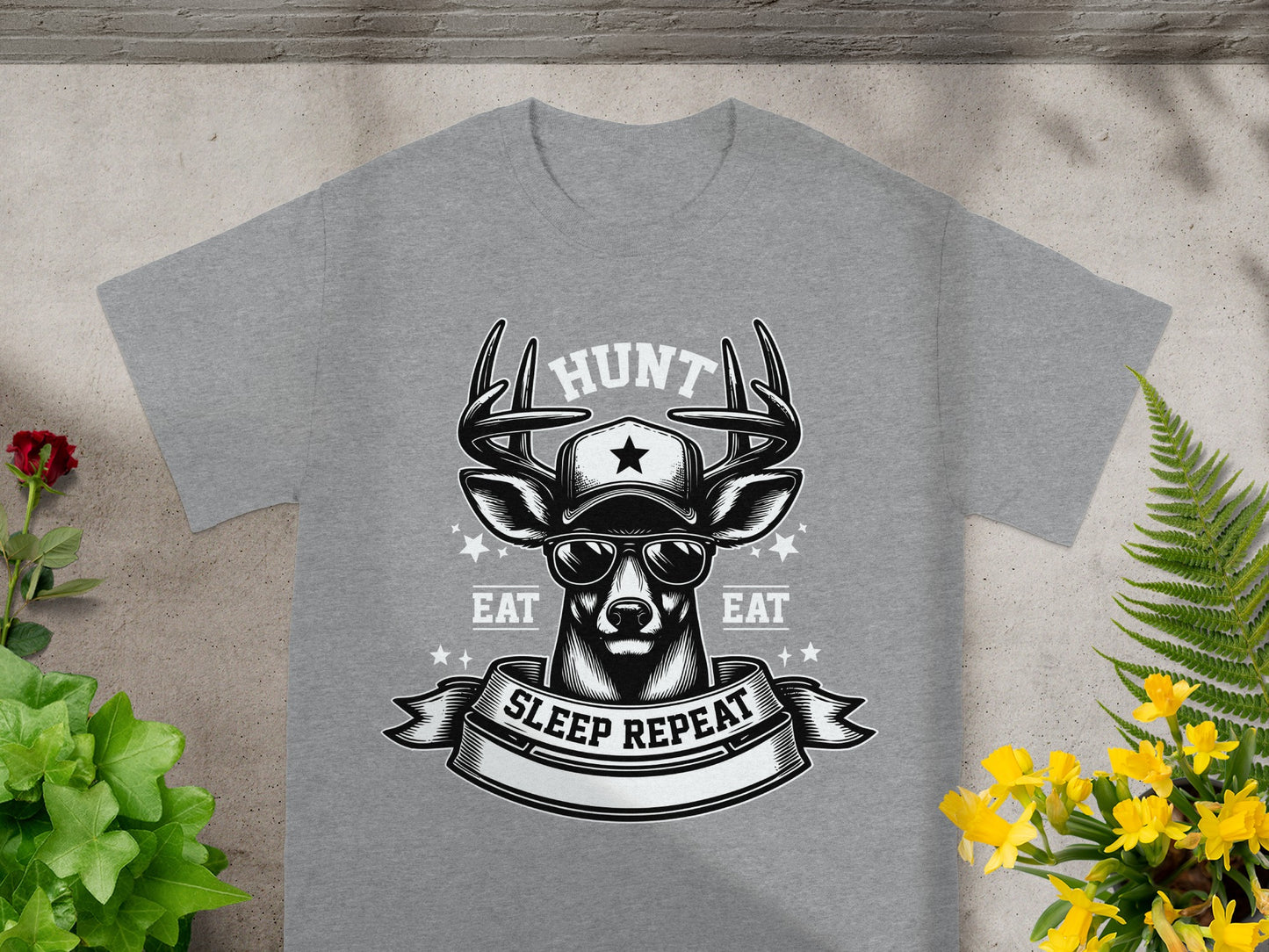 Grey t-shirt with a deer wearing sunglasses and a cap, text says "Hunt Sleep Repeat Eat".