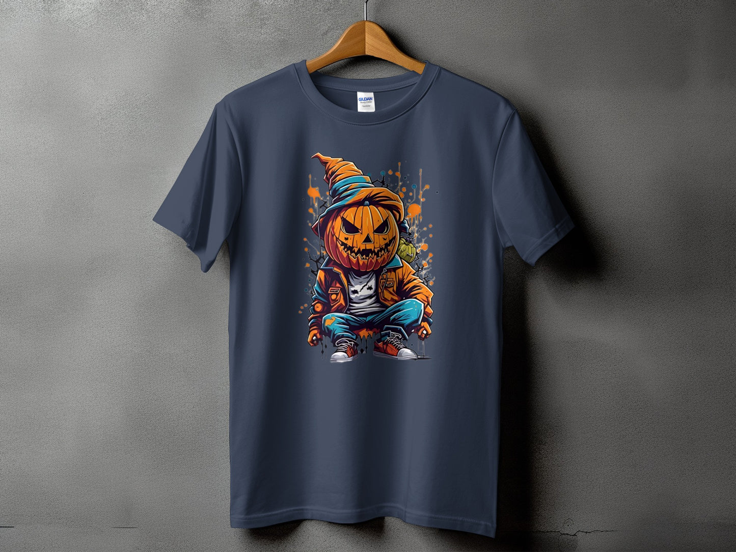 T-shirt with a sitting jack-o'-lantern character wearing a hat and jacket.