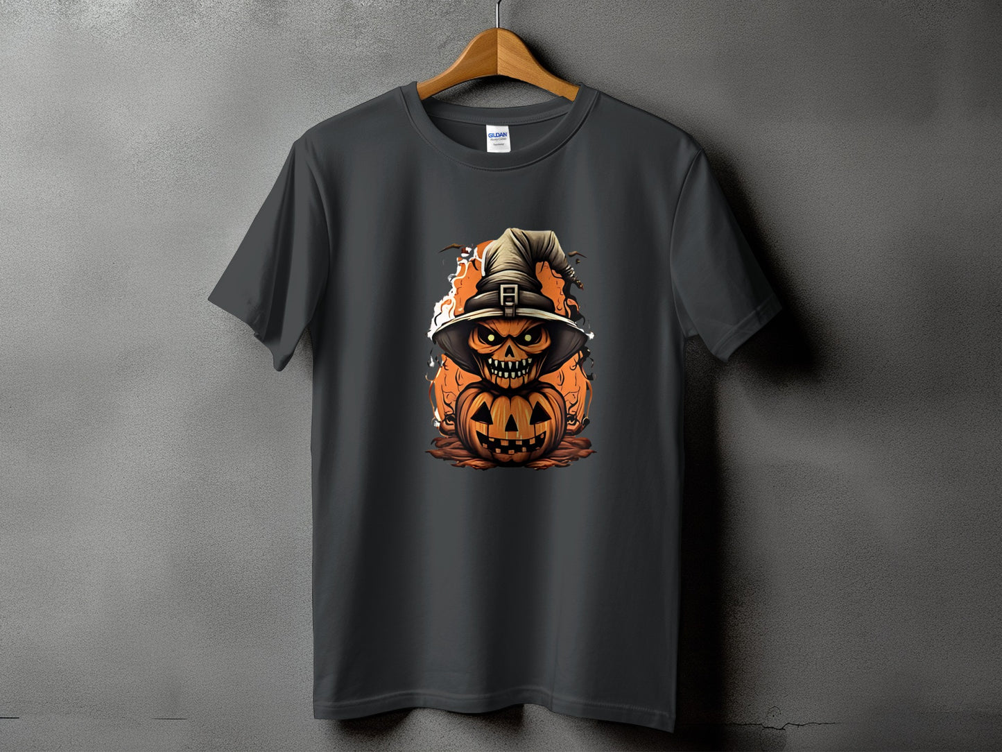 Dark gray t-shirt featuring a Halloween pumpkin character wearing a witch hat.
