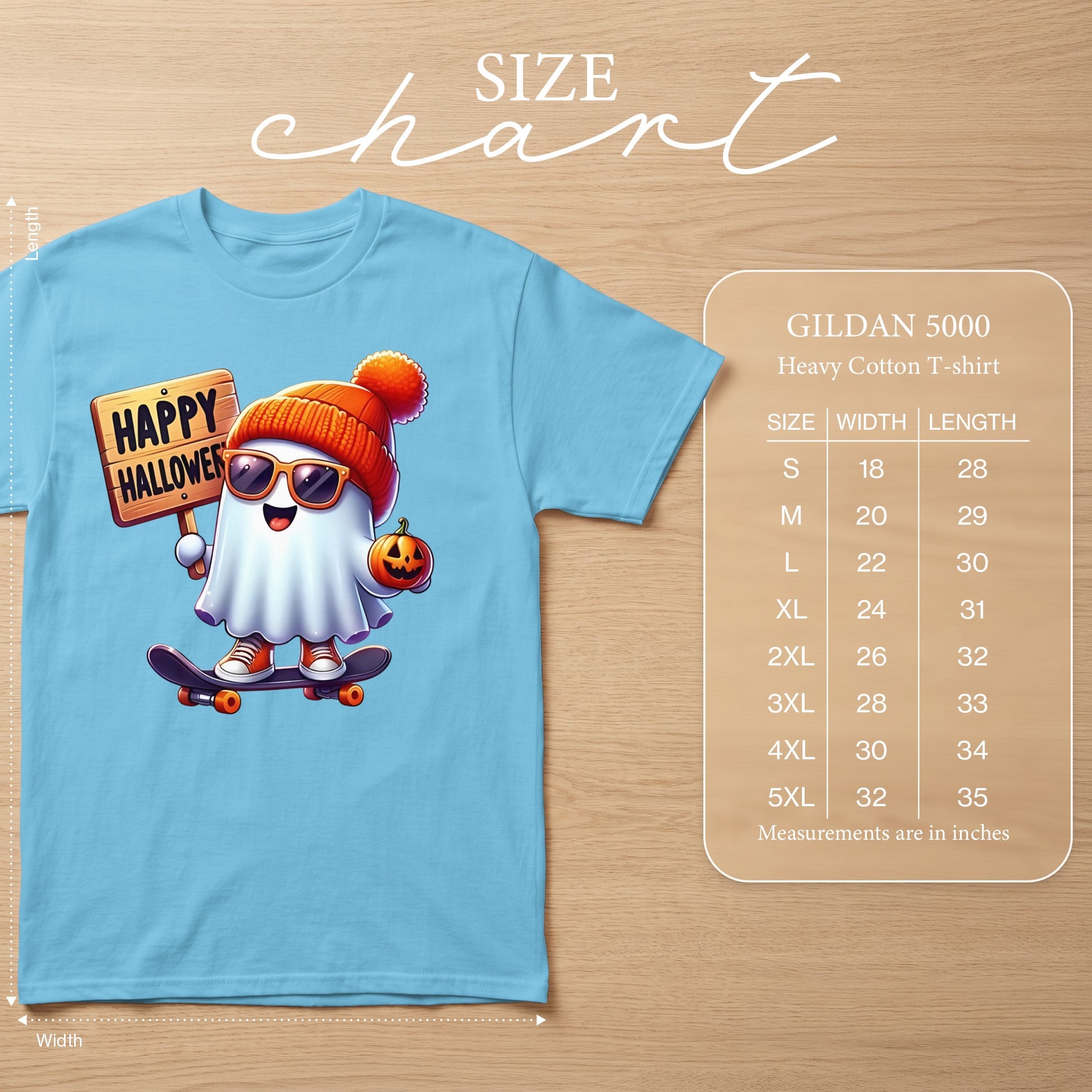 Light blue t-shirt with a cartoon ghost on a skateboard, holding a "Happy Halloween" sign and pumpkin.