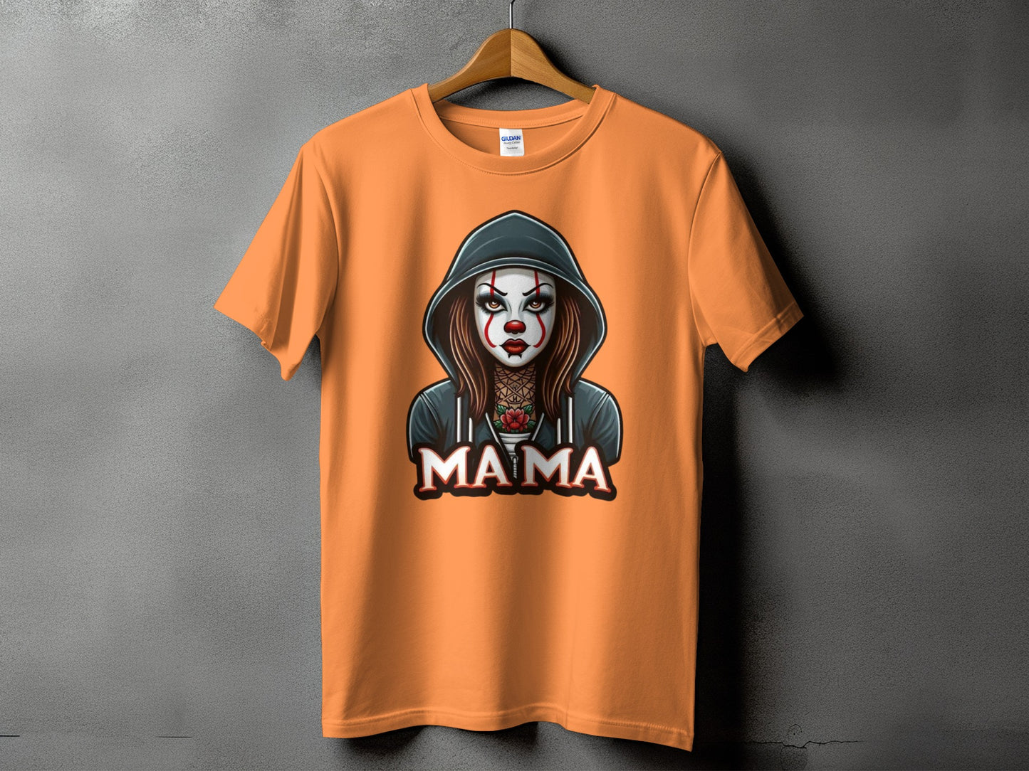 Orange t-shirt with graphic of a clown with the word "MAMA" below.