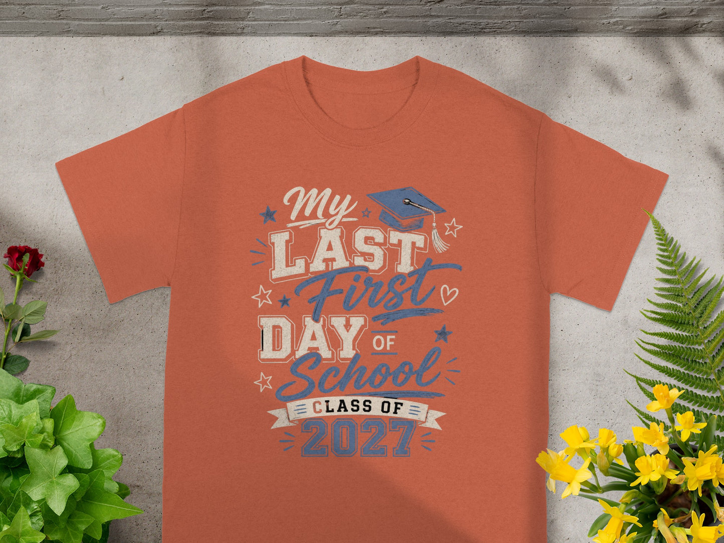Coral t-shirt with "My Last First Day of School Class of 2027" text.