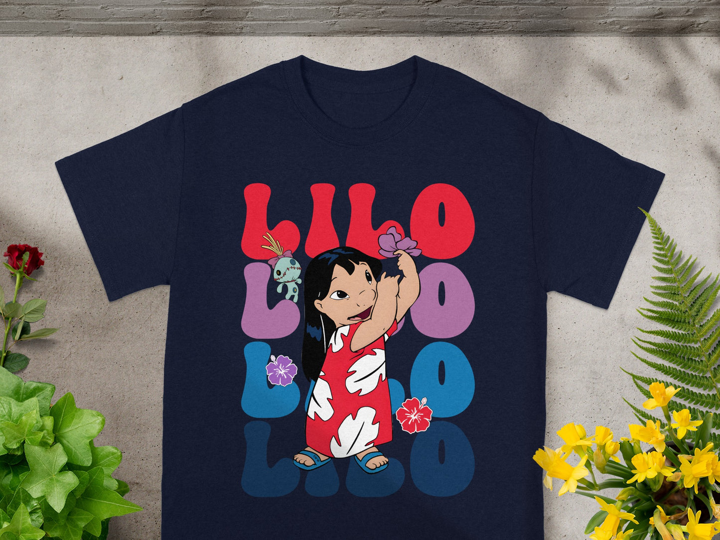 Lilo wearing a floral dress holding a flower, with "Lilo & Stitch" text.