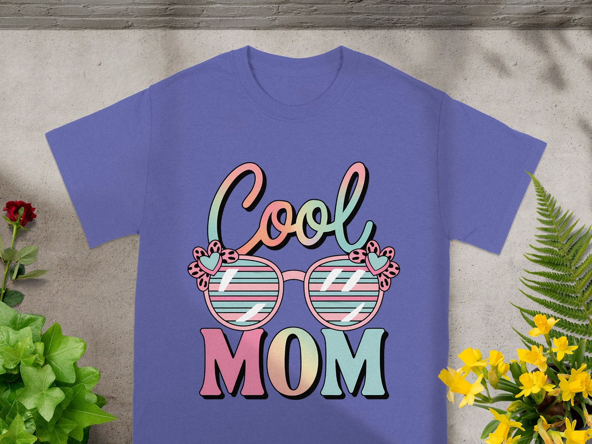 Purple t-shirt with "Cool MOM" and heart-adorned sunglasses graphic.
