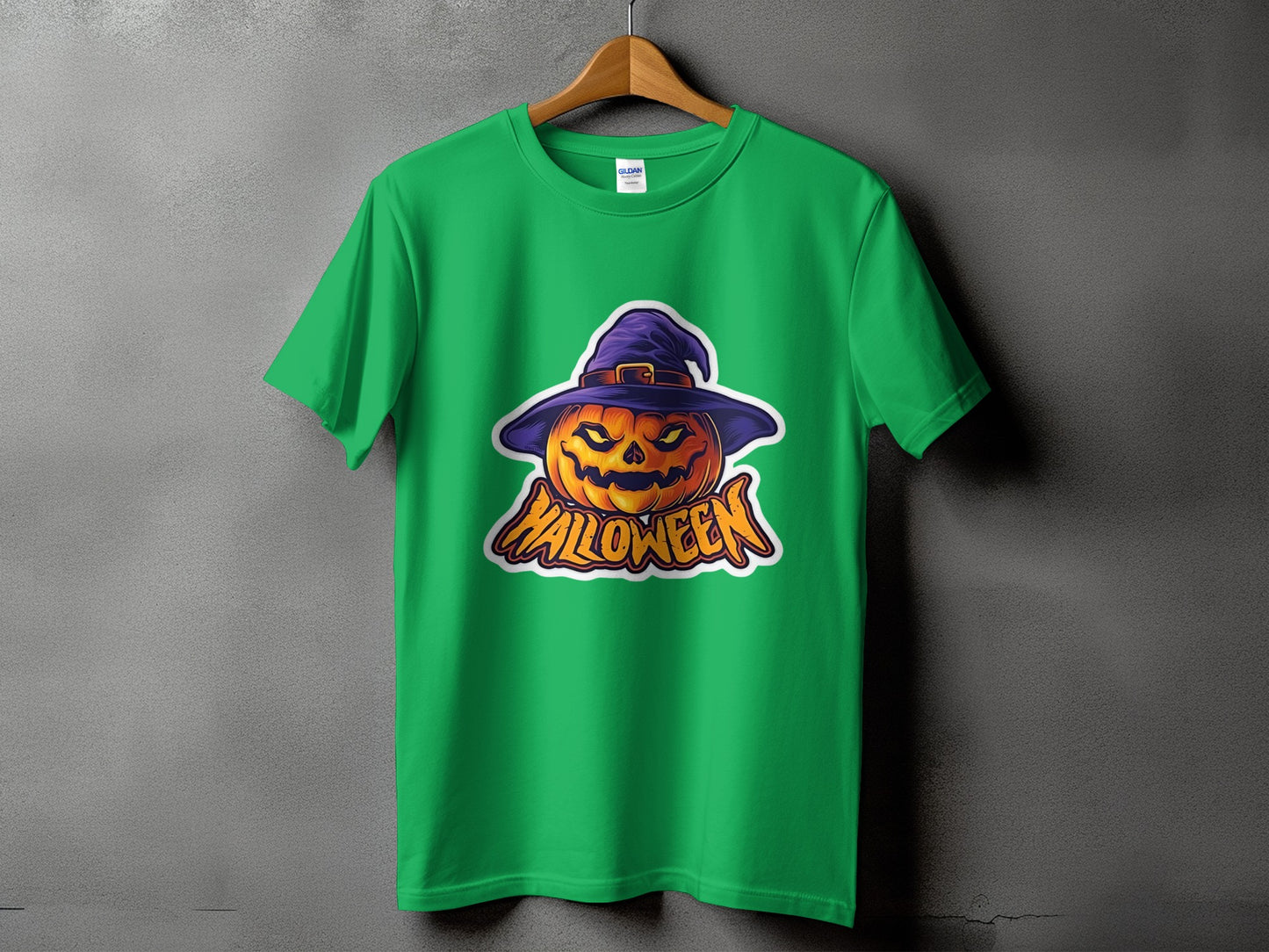 Green t-shirt with Halloween pumpkin graphic and text.