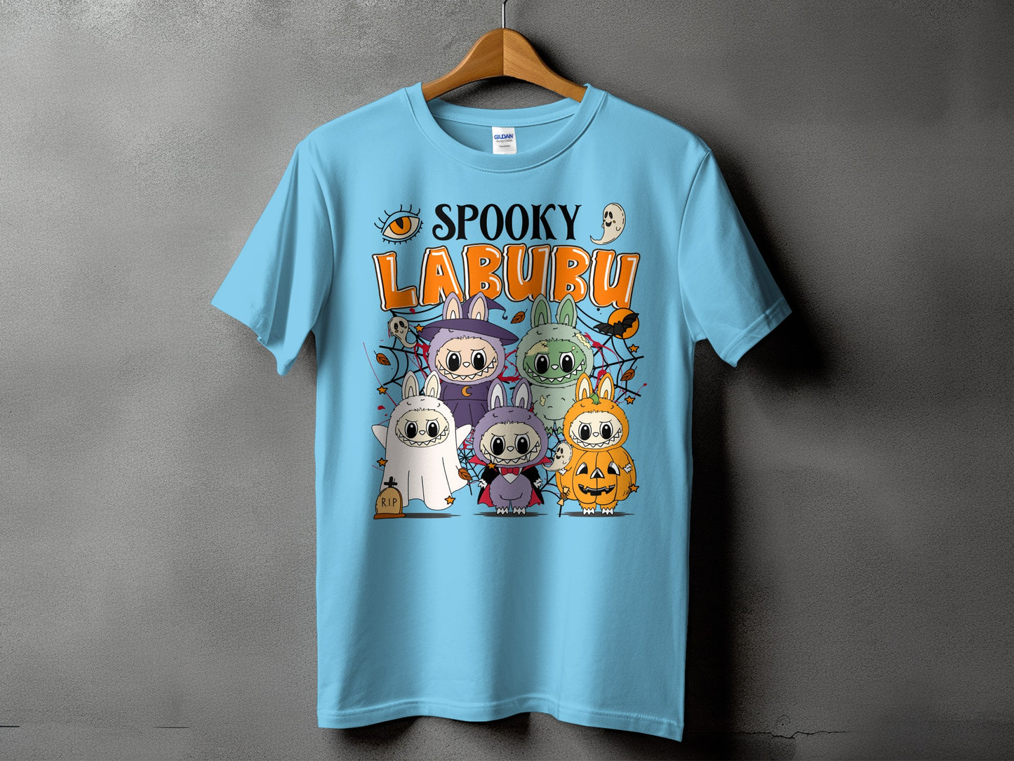 Light blue t-shirt with "Spooky Labubu" text and Halloween-themed bunny characters.