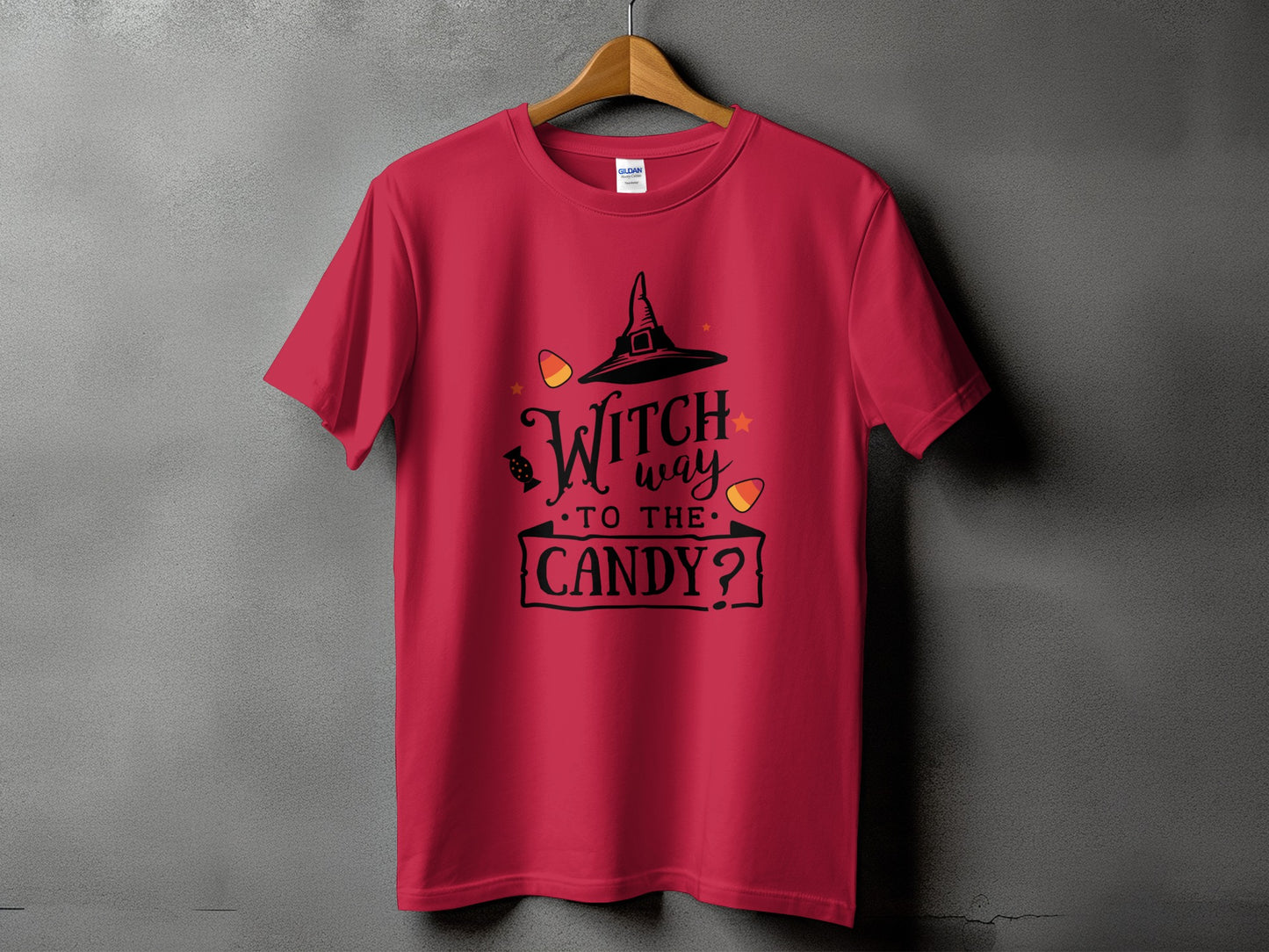 Red t-shirt with "Witch way to the candy?" Halloween graphic.