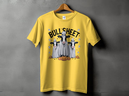 Yellow t-shirt with "BULLSHEET" text and three cows dressed as ghosts with pumpkins.