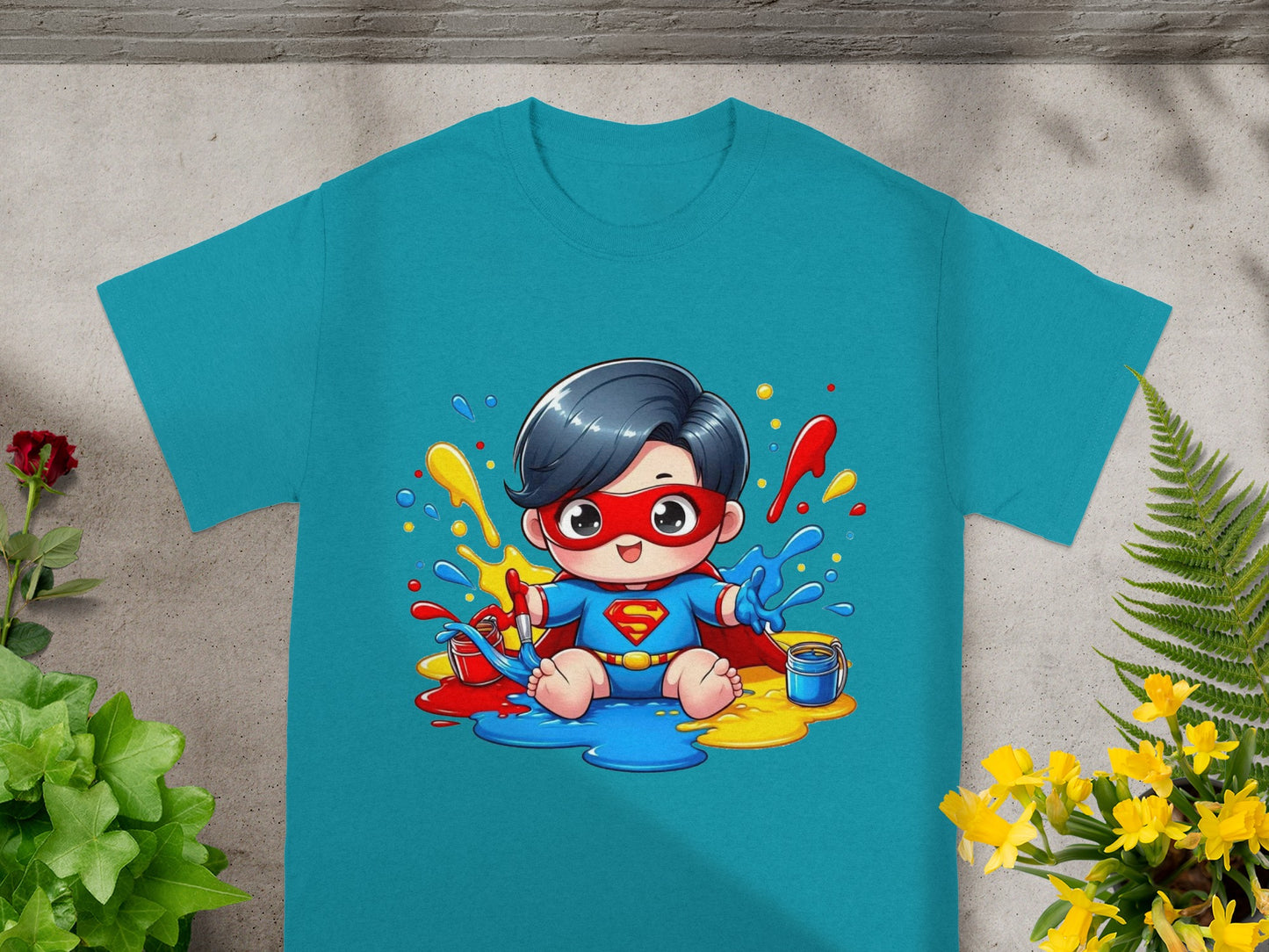 Cartoon baby in superhero costume sitting in spilled paint.