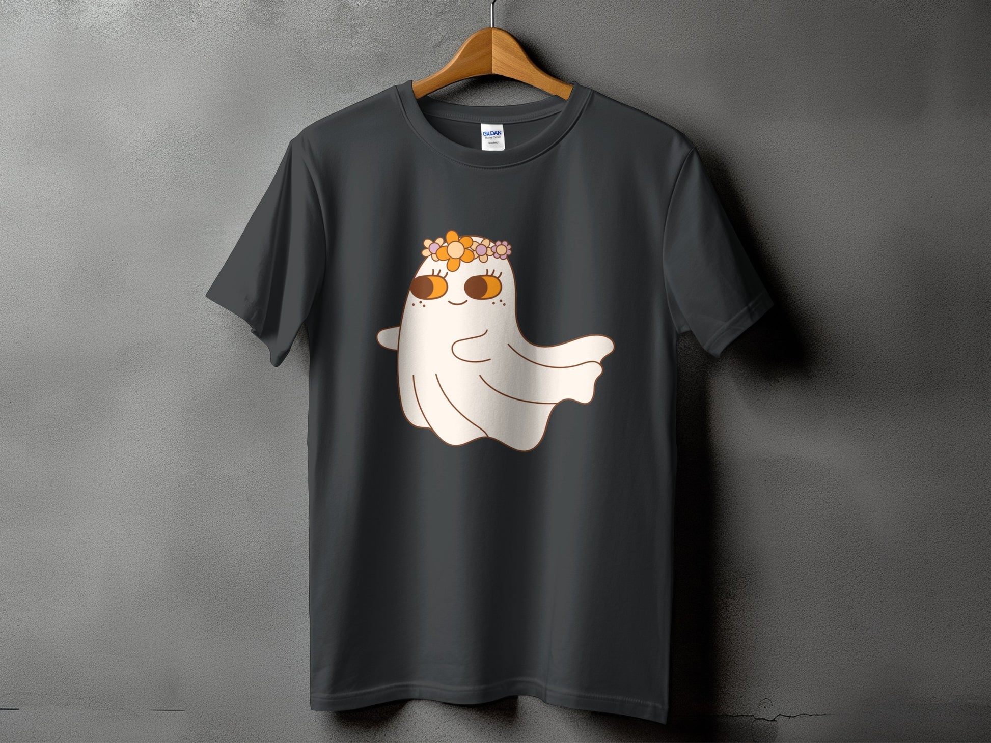 Gray t-shirt with a cartoon ghost wearing a flower crown and smiling.
