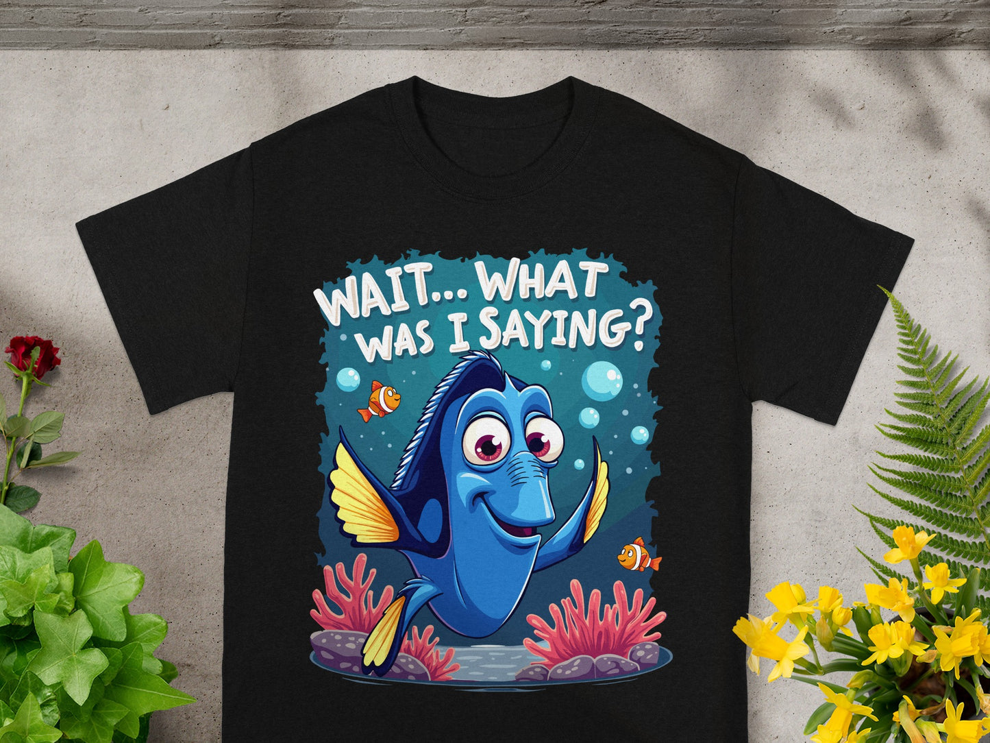 Black t-shirt featuring Dory from Finding Nemo saying "Wait... What Was I Saying?"