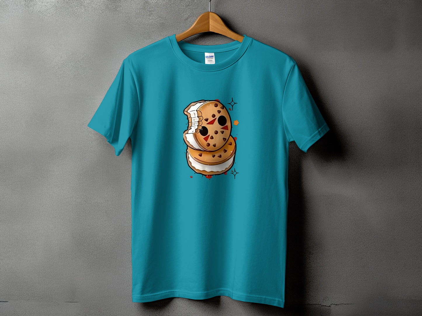 Teal t-shirt with a cartoon ice cream sandwich graphic featuring a bitten cookie and red splatters.
