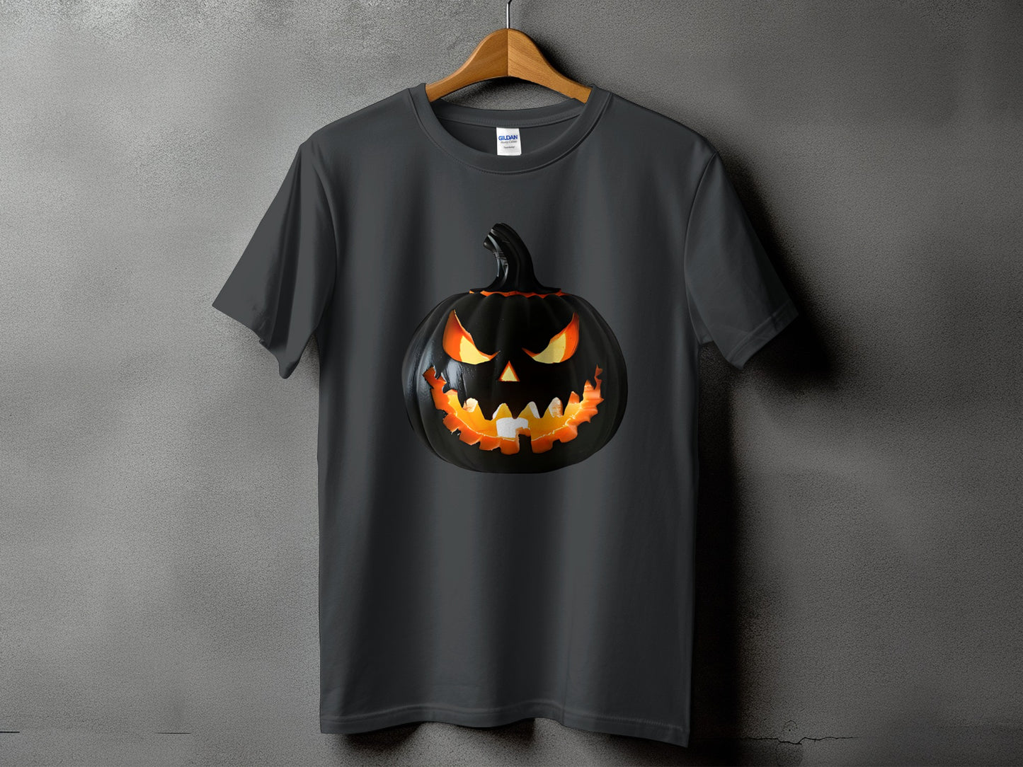 Dark grey t-shirt with a glowing, carved black pumpkin Halloween graphic.