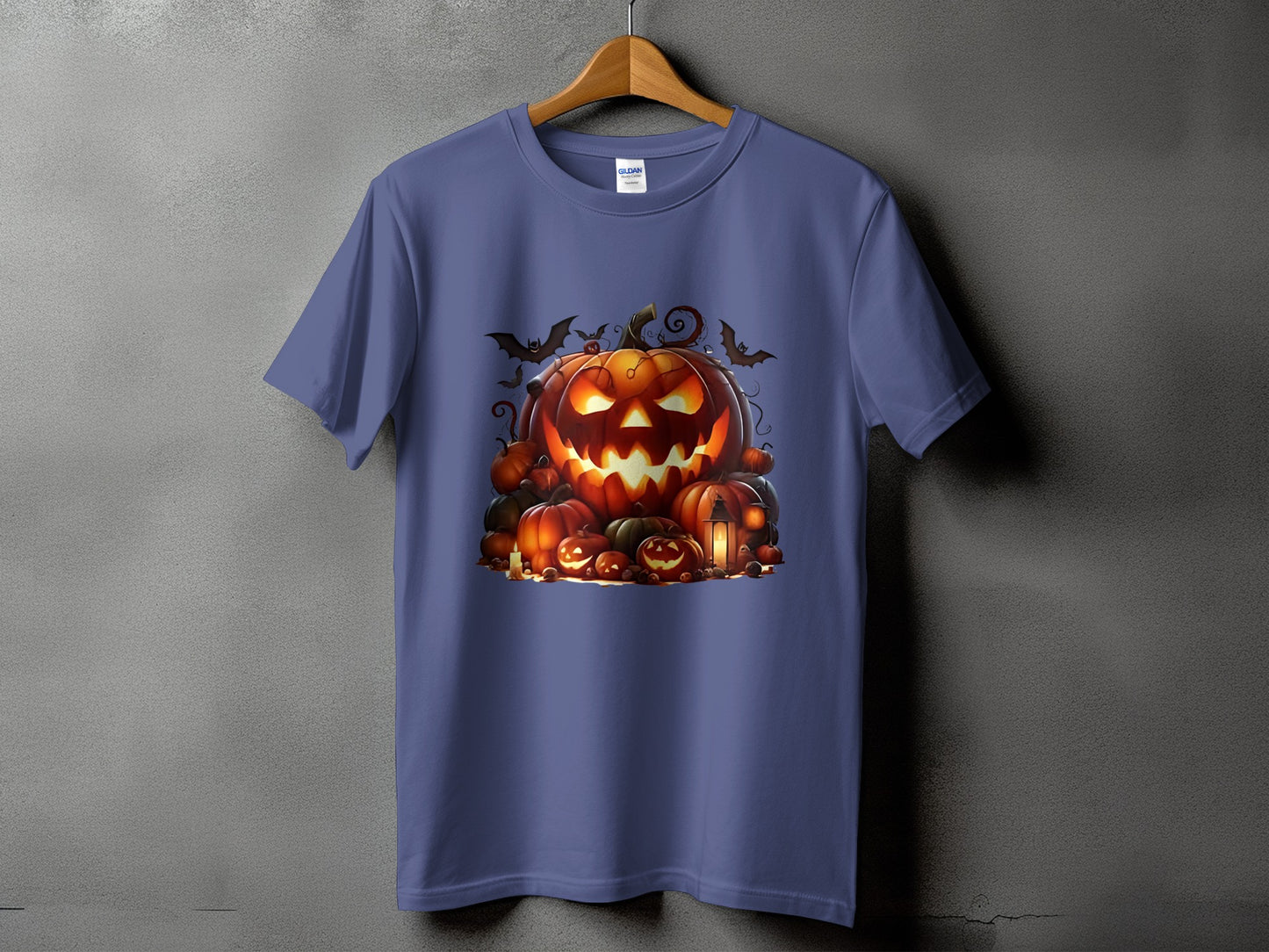 Purple t-shirt with a Halloween graphic featuring carved pumpkins and bats.