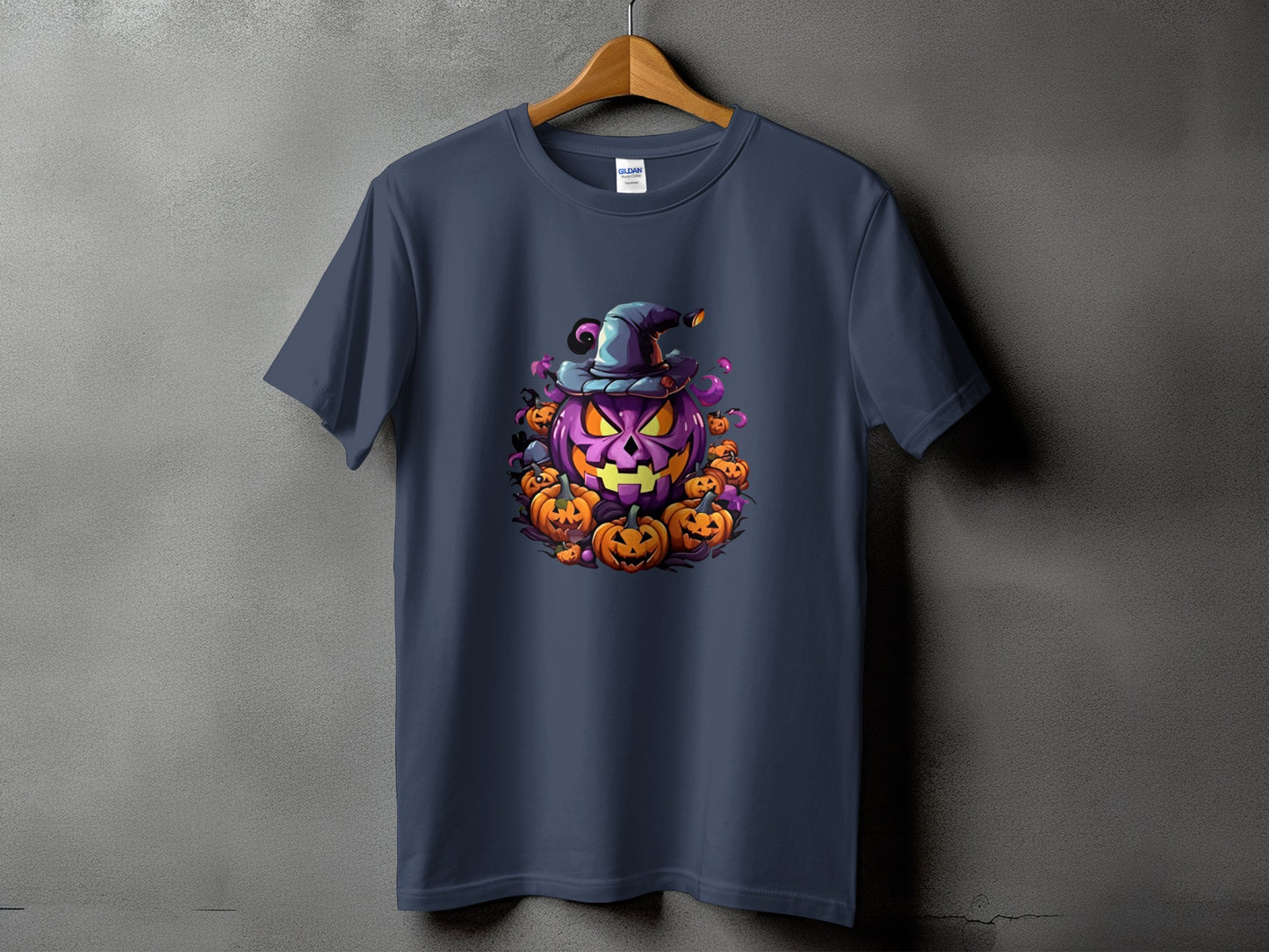 Dark blue t-shirt with a cartoon purple jack-o'-lantern and surrounding pumpkins graphic.