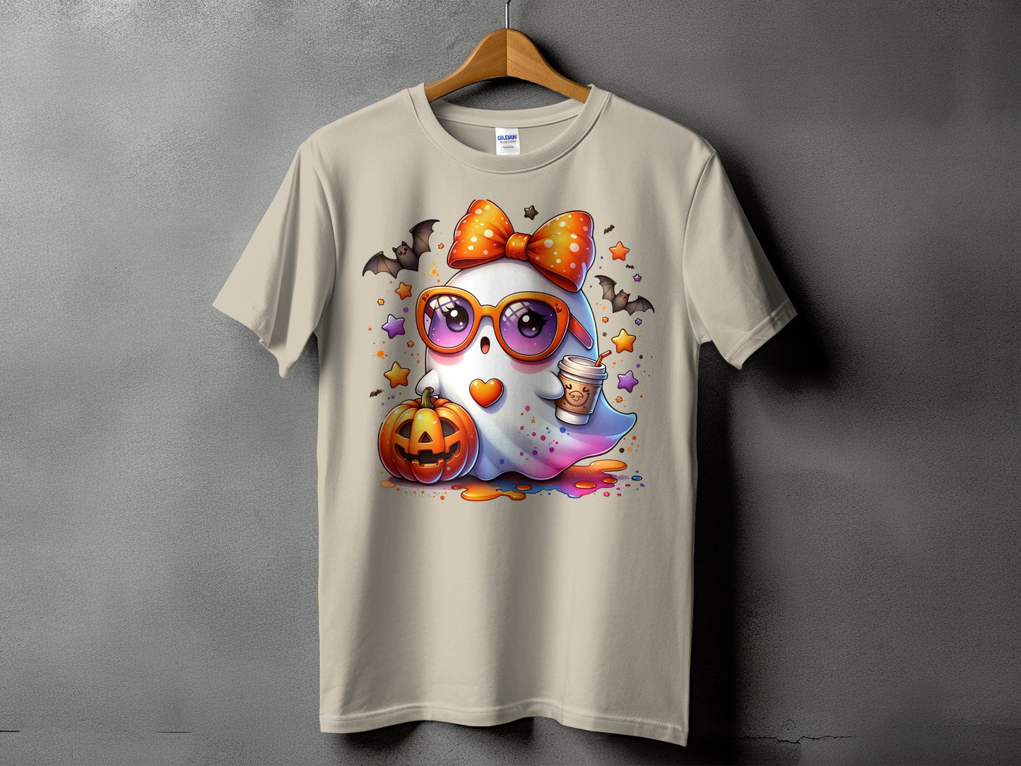 Cute ghost with pumpkin, coffee, and bats on a beige t-shirt.