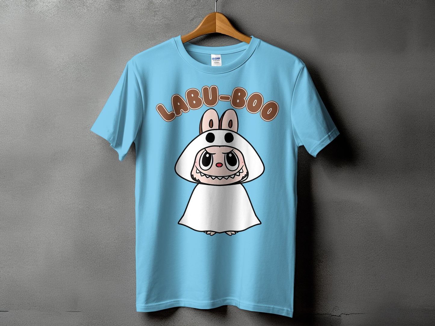 Light blue t-shirt with a cartoon character and "LABU-BOO" text.