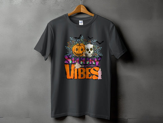 Dark grey t-shirt with "Spooky Vibes" Halloween graphic featuring pumpkin, skull, bats, and candle.