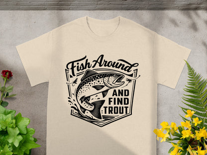 T-shirt graphic with trout, flies, and text: "Fish Around and Find Trout."