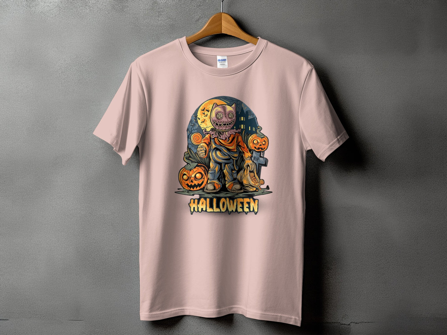 Halloween t-shirt featuring a scarecrow, pumpkins, and the word "HALLOWEEN".