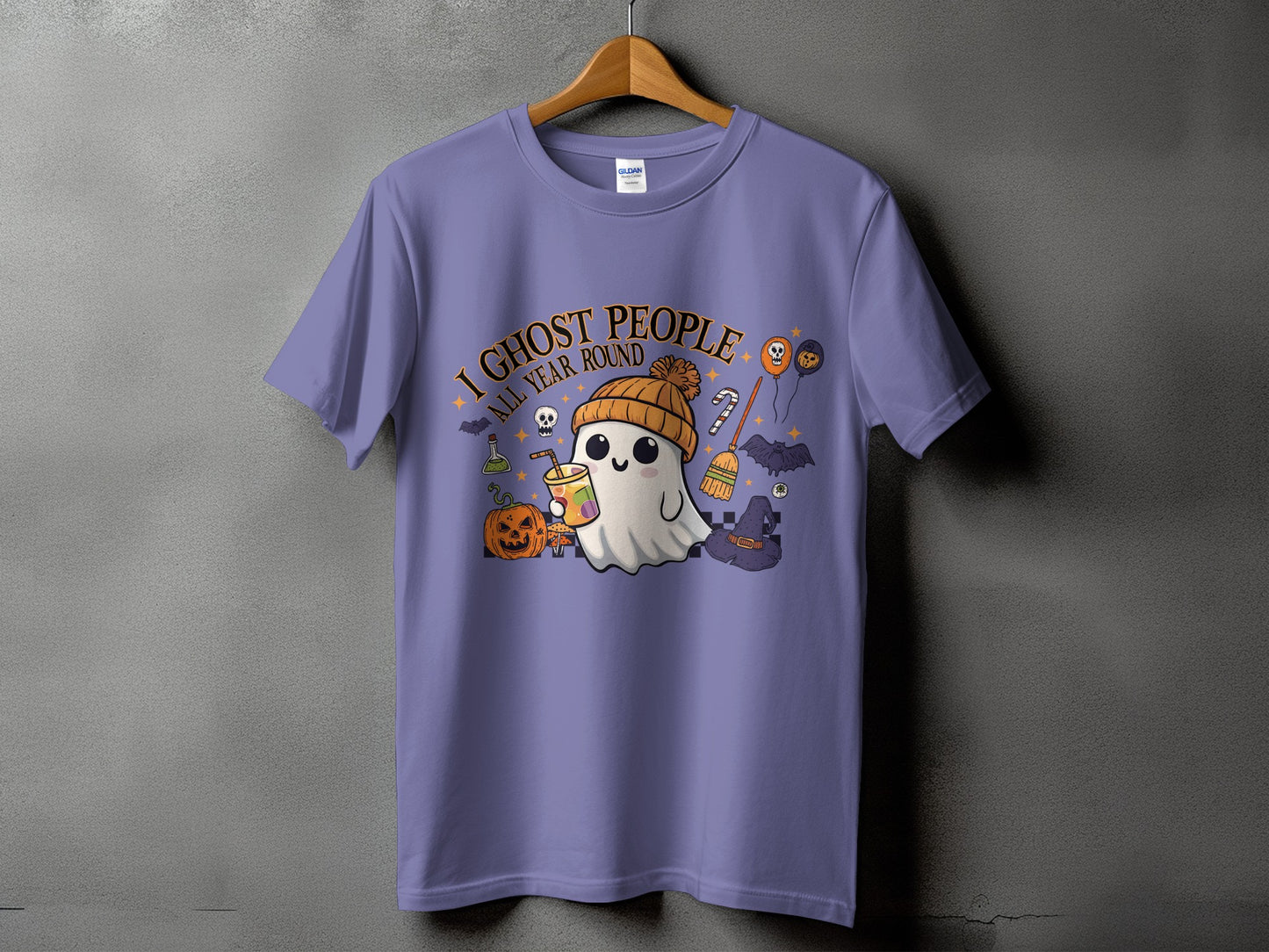 Purple t-shirt with "I Ghost People All Year Round" and cartoon Halloween graphics.