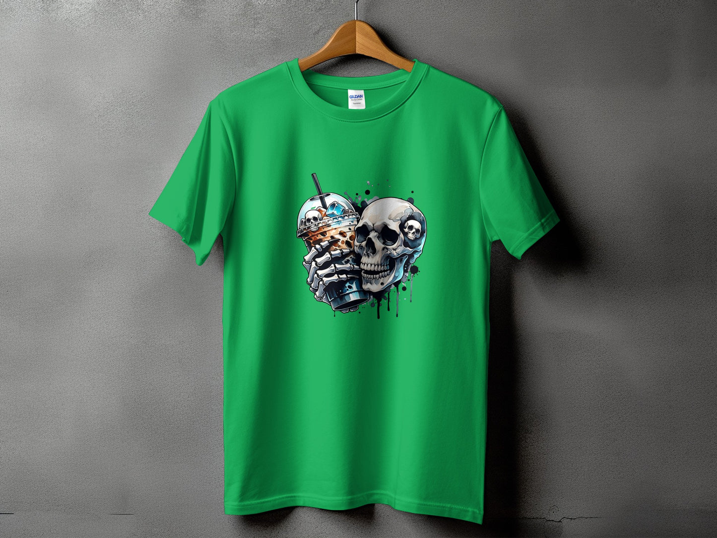 Green t-shirt with graphic of skeleton hands holding iced coffee and a skull.