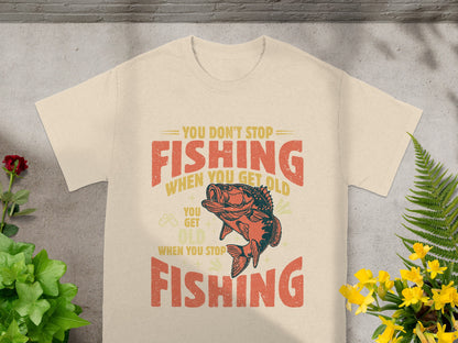 T-shirt with text "You Don't Stop Fishing When You Get Old. You Get Old When You Stop Fishing."