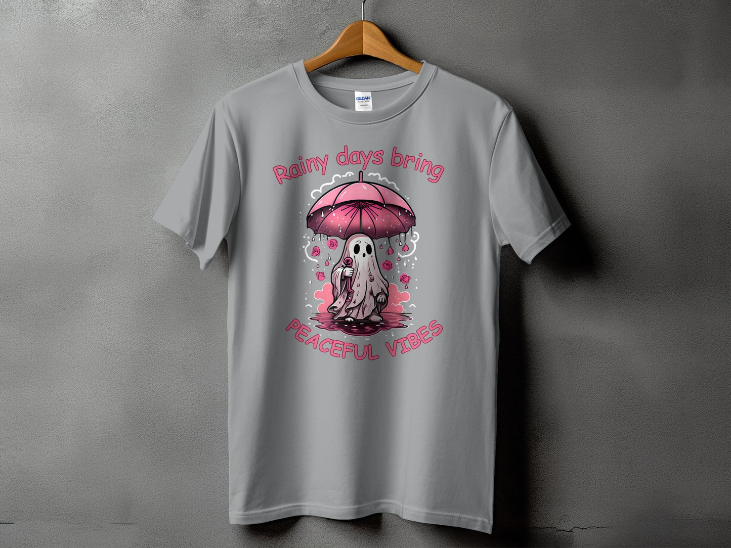 Ghost under pink umbrella with roses, text "Rainy days bring peaceful vibes".