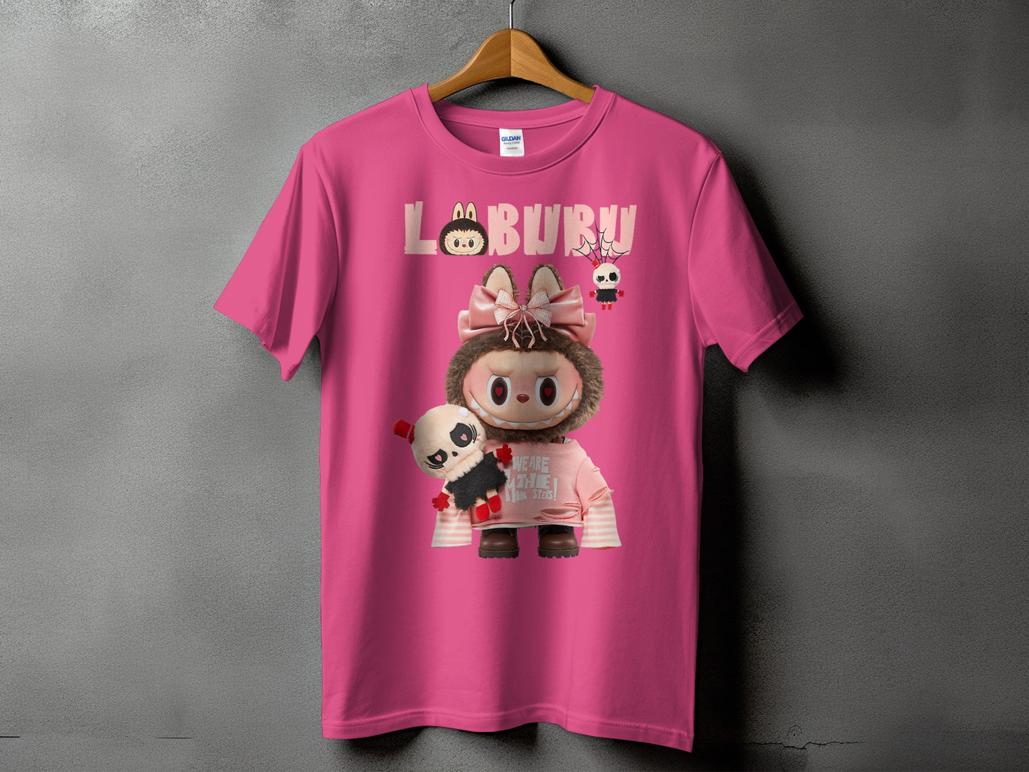 Pink t-shirt with "LO BURU" text and plush toy characters printed on front.