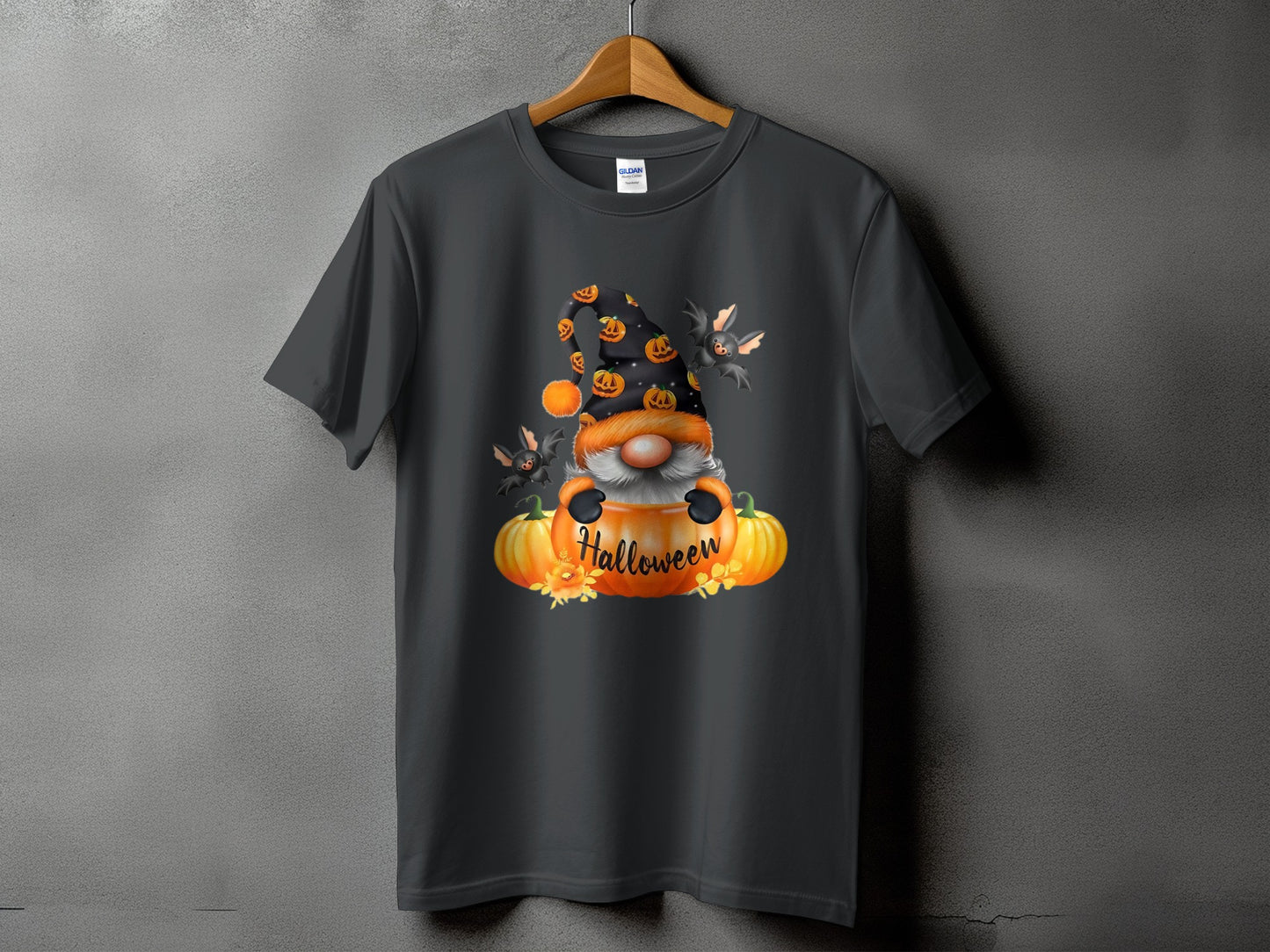 Gnome with bats and pumpkins on a dark grey t-shirt, reads "Halloween."