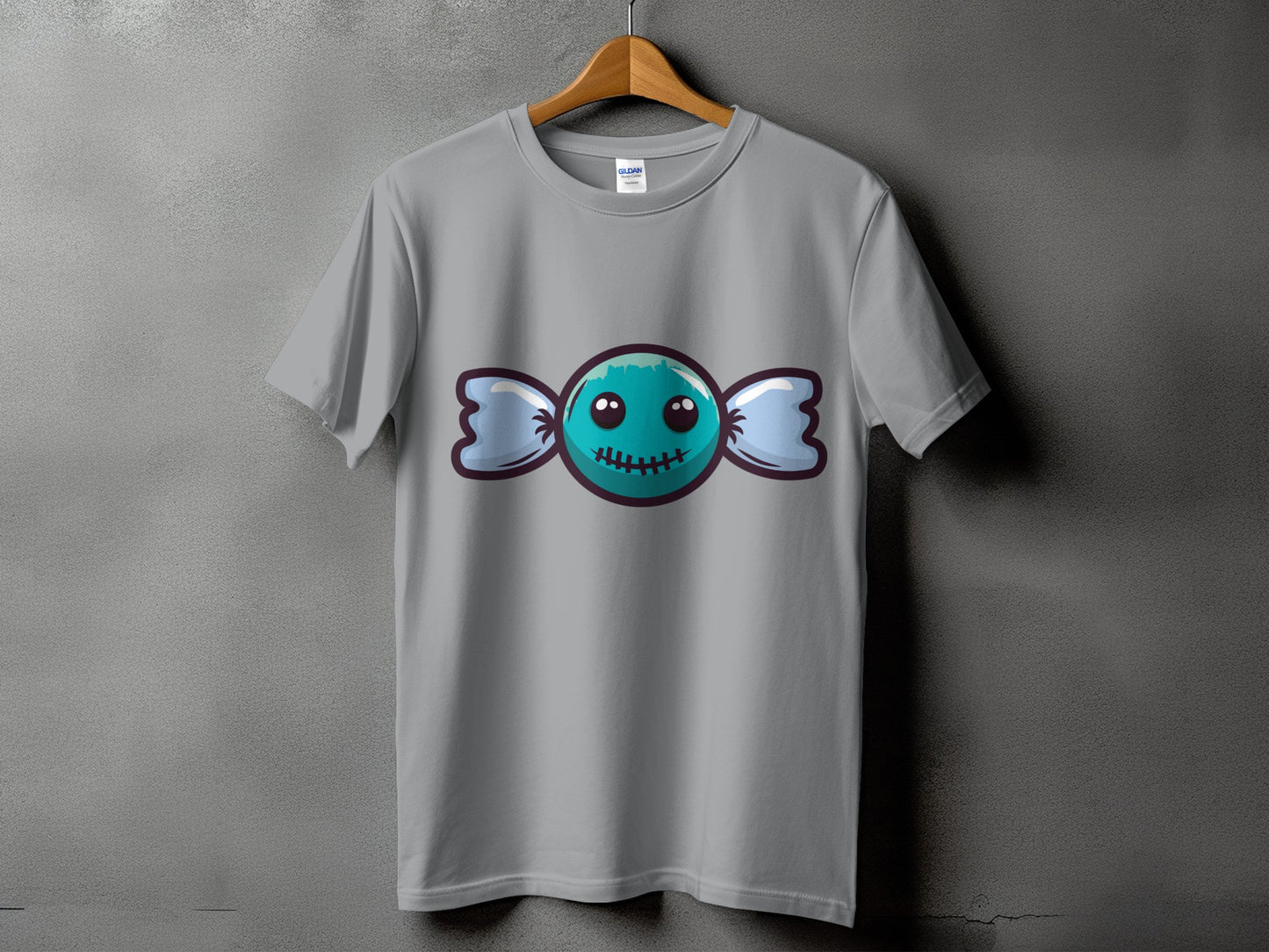 Grey t-shirt with a cute cartoon candy character featuring a stitched mouth.