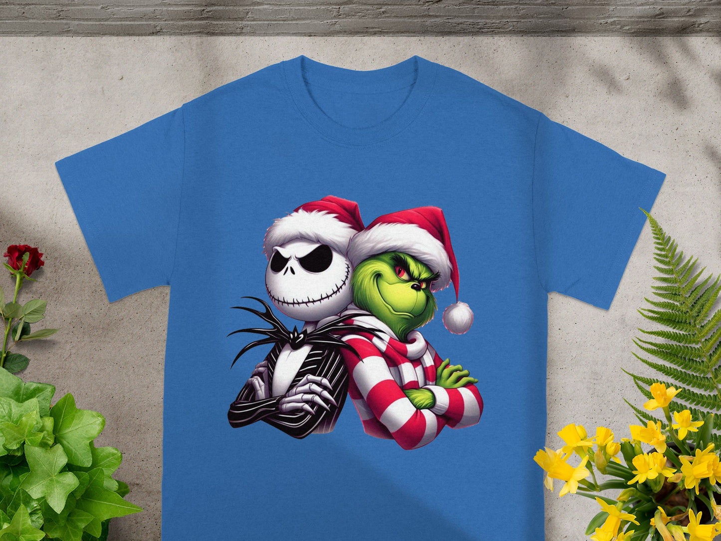 Jack Skellington and The Grinch wearing Santa hats with arms crossed.