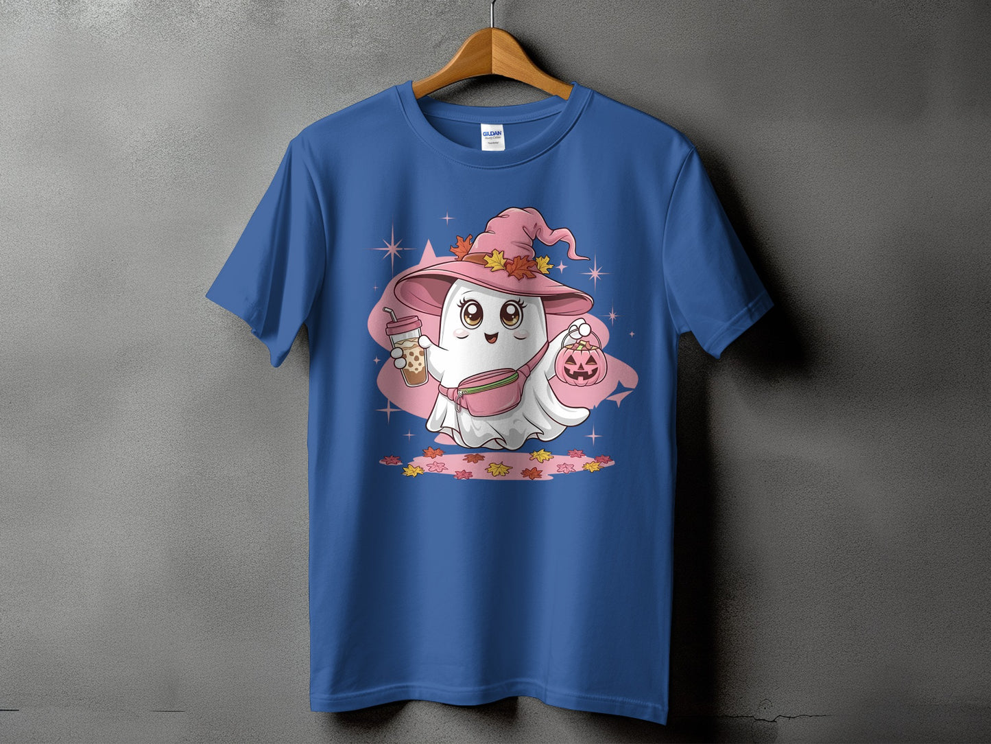 Blue t-shirt with a cartoon ghost in a witch hat holding a bubble tea and pumpkin.