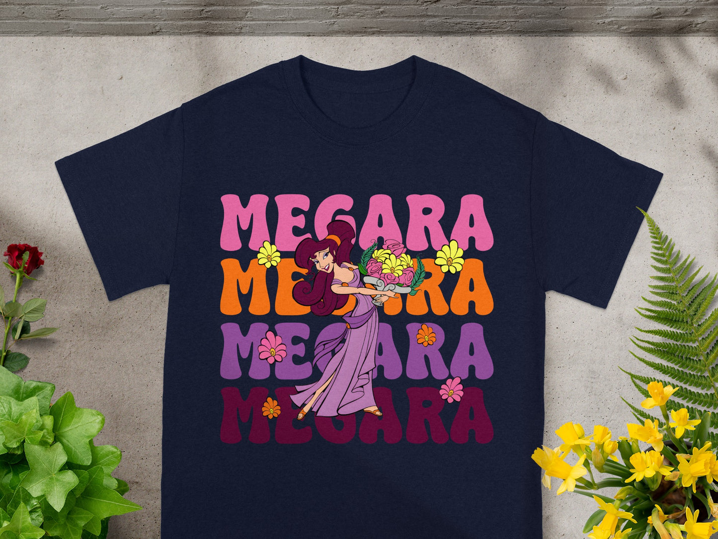 Megara text and illustration on a navy blue t-shirt.