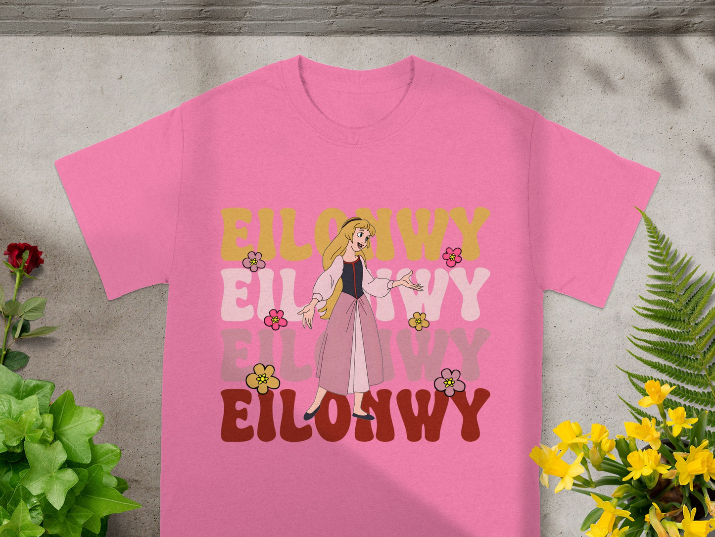 Pink t-shirt with "EILONY" in colorful floral font.