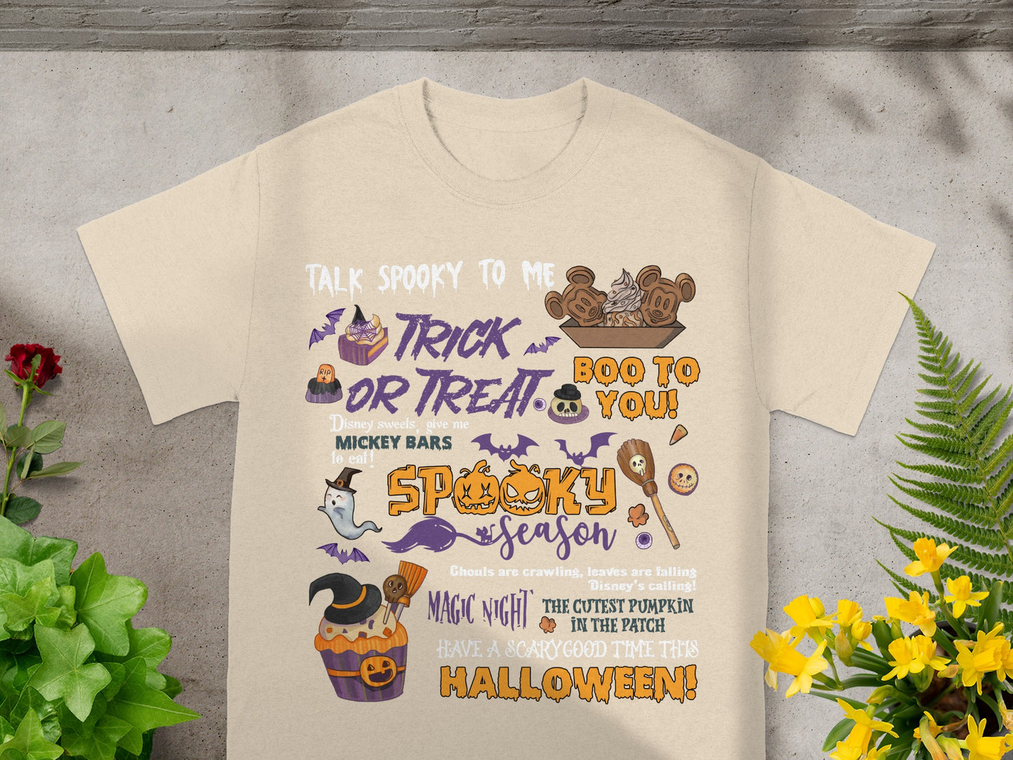 Light beige t-shirt with Halloween graphics and text including "Spooky Season".