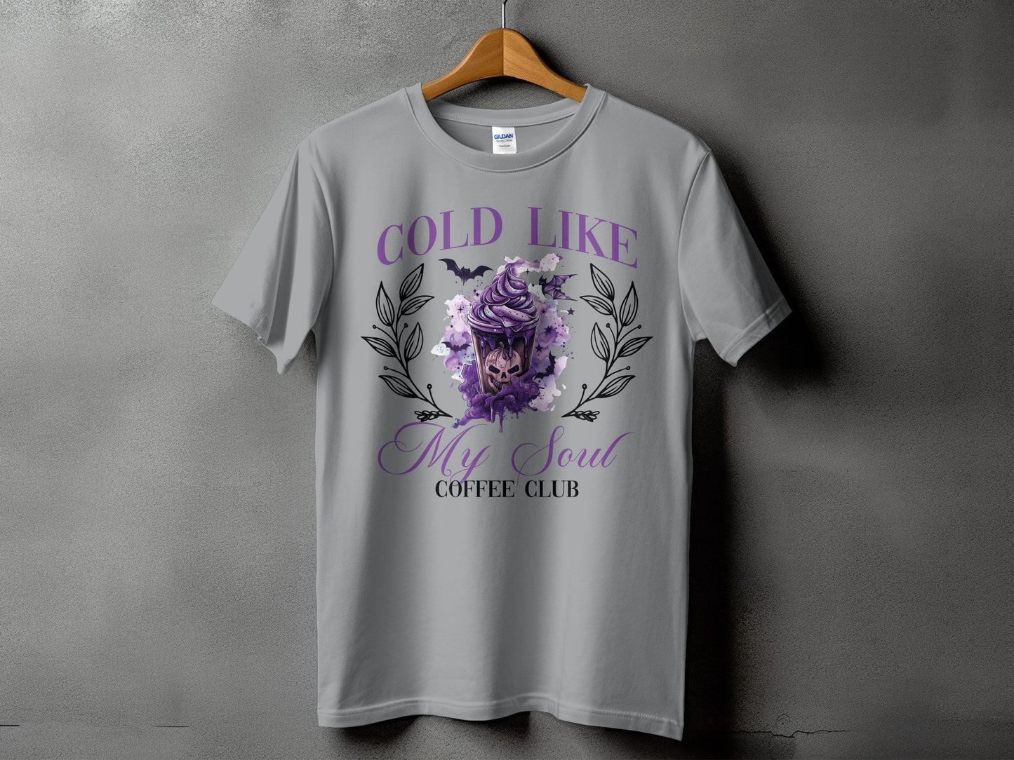 Grey t-shirt with "Cold Like My Soul Coffee Club" text and skull coffee design.