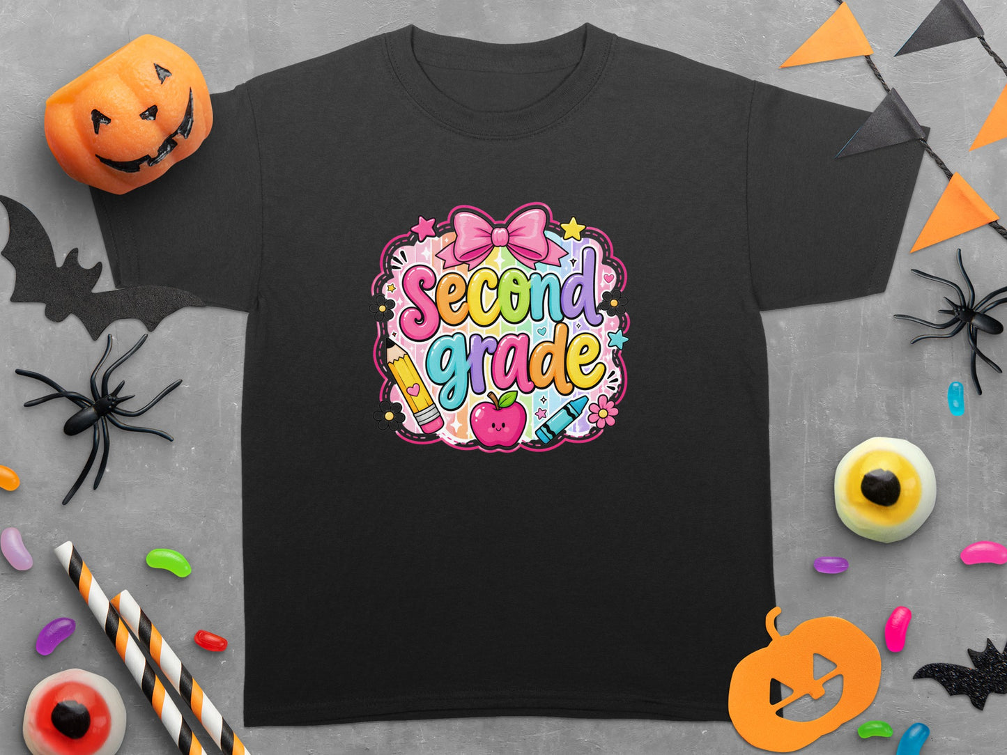 Black shirt with "Second Grade" text and cartoon school supplies.