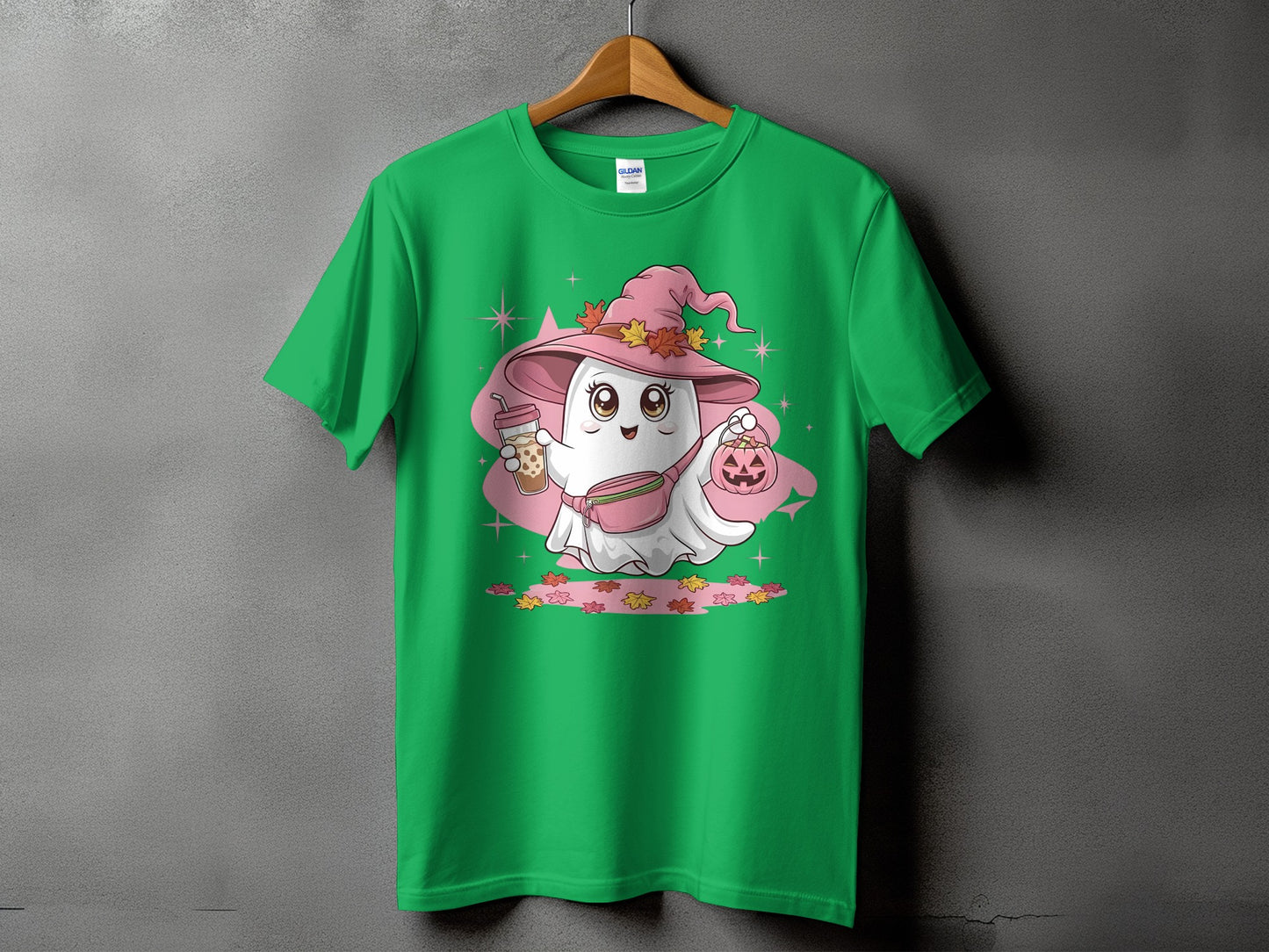 Green t-shirt with a cute ghost in a witch hat holding a boba drink and pumpkin.